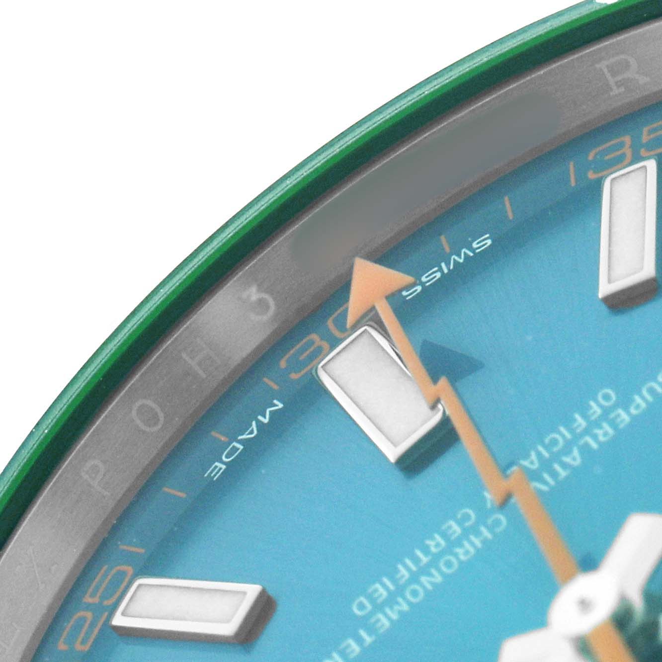 The image shows a close-up of a Rolex Milgauss 116400GV Men's Stainless Steel Blue Dial watch, focusing on the dial, minute markers, and arrow-shaped second hand.