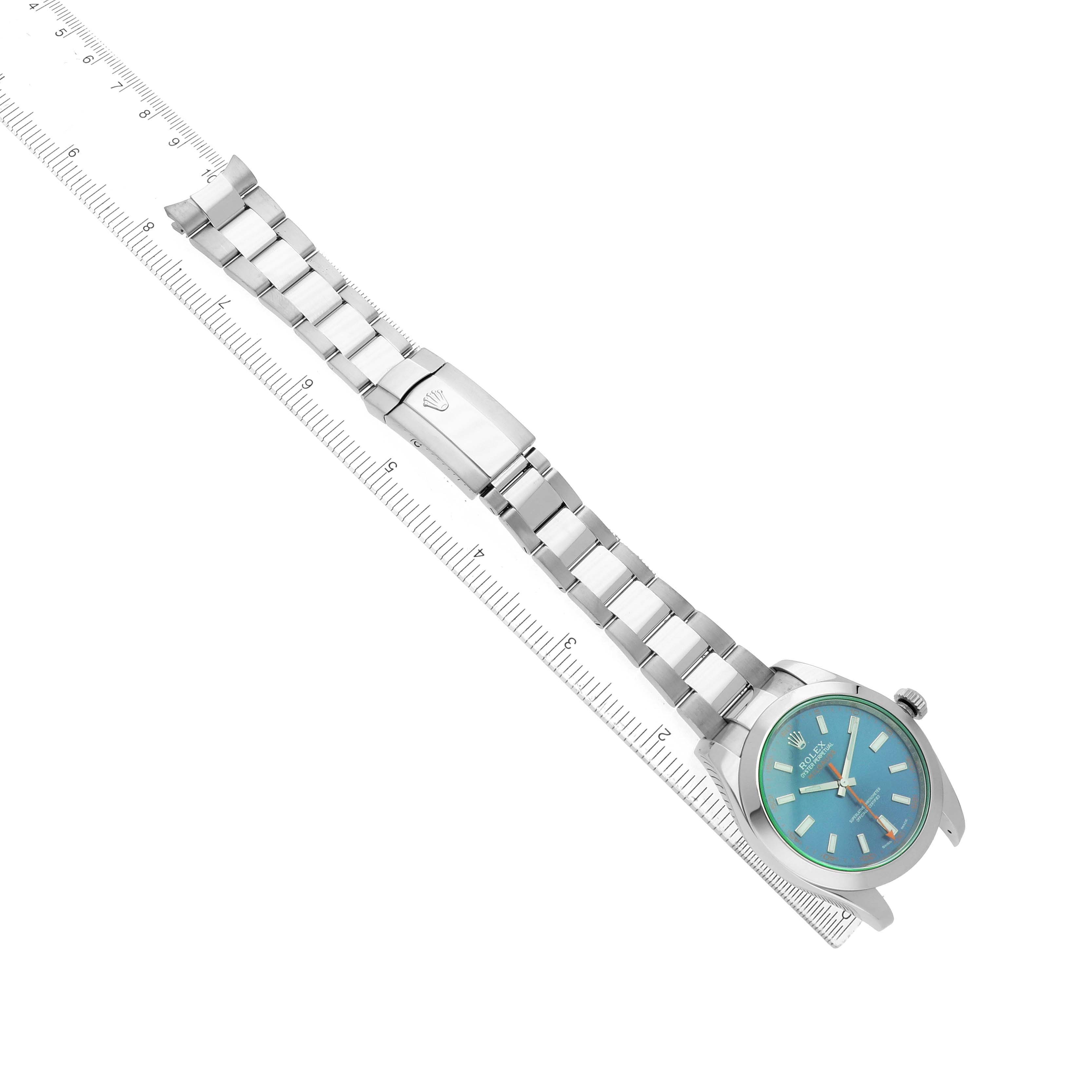 The Rolex Milgauss 116400GV Men's Stainless Steel Blue Dial watch is shown at an angled top view, displaying its bracelet, clasp, and colorful dial.