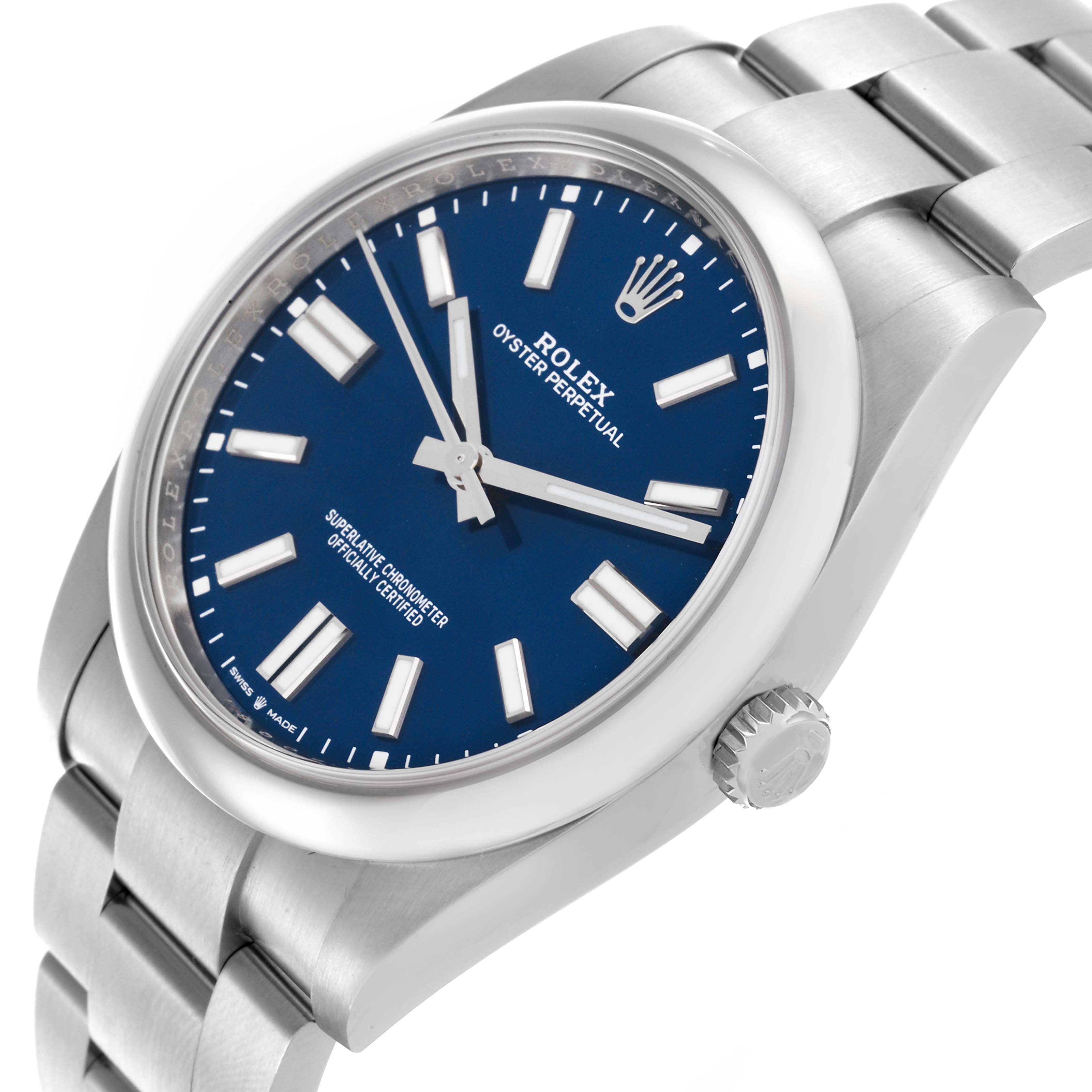 The Rolex Oyster Perpetual 124300 Men's Stainless Steel Blue Dial 124300 Men's Stainless Steel Blue Dial watch is shown at an angle highlighting the face, bezel, crown, and part of the bracelet.