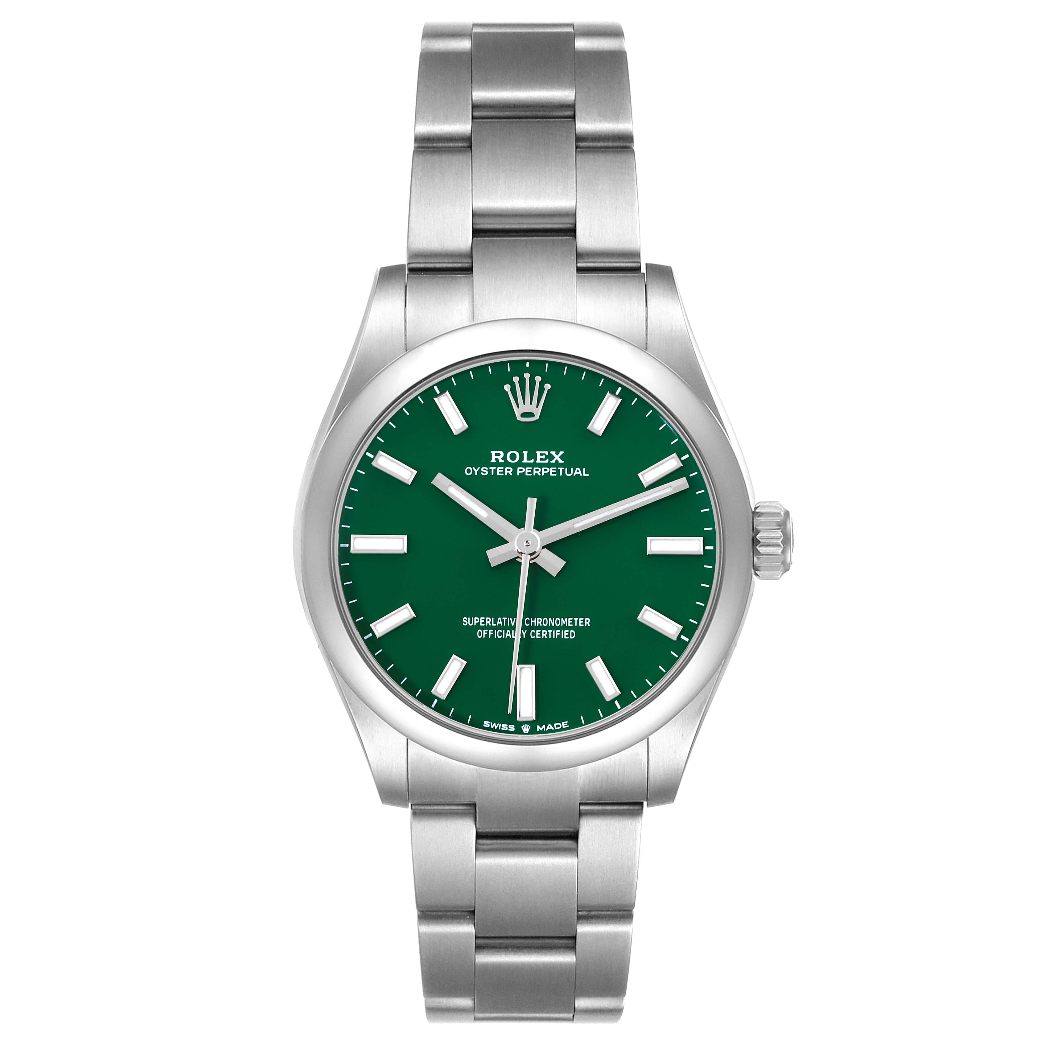 The image shows a front view of the Mid-Size Rolex Oyster Perpetual watch, highlighting the green dial, hands, and bracelet.