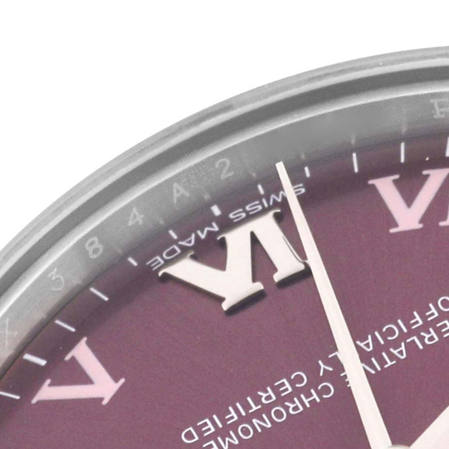 This image shows a close-up of the dial and bezel edge of a Rolex Mid-Size 177200 Women's Stainless Steel Purple Dial 177200 Women's Stainless Steel Purple Dial model watch.