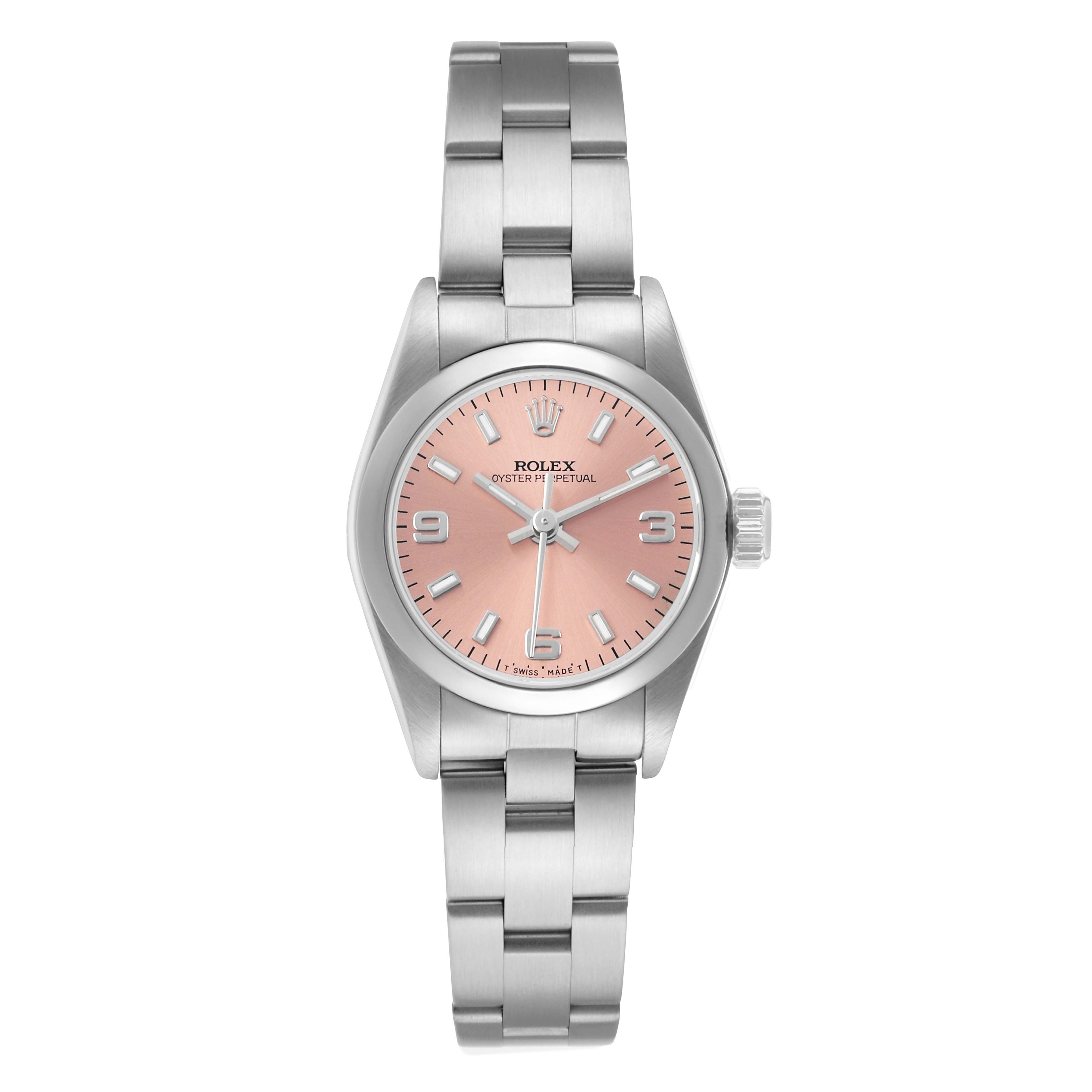 The Rolex Oyster Perpetual 67180 Women's Stainless Steel Pink Dial watch is shown from a top-down angle, displaying the dial, bezel, and bracelet.