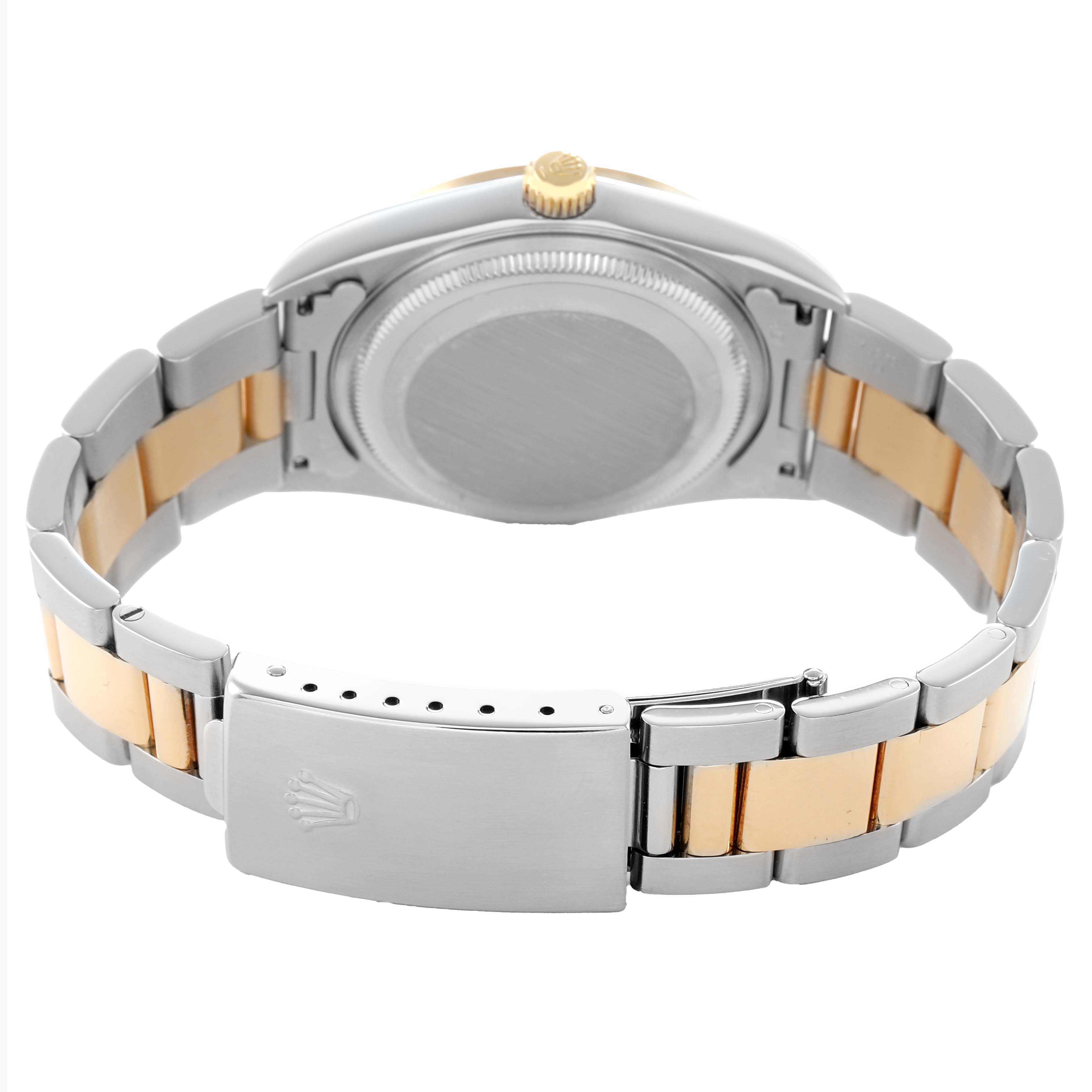 The image shows the back view of a Rolex Oyster Perpetual 14203 Men's Steel and Gold (two tone) Black Dial, highlighting the two-tone bracelet and case back.