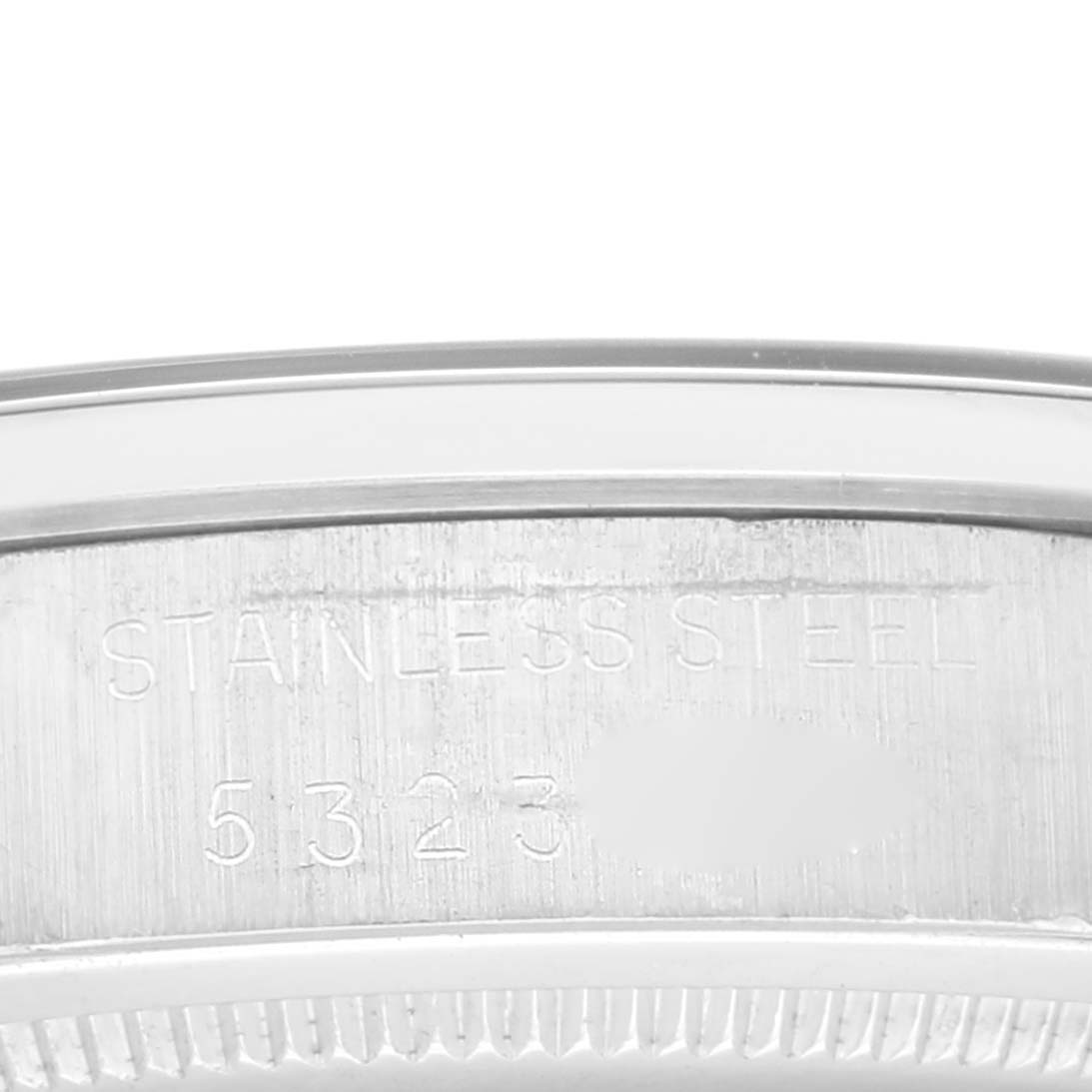 This image shows a close-up view of the case back and engraving on the Rolex Vintage Collection 6694 Men's Stainless Steel Black Dial 6694 Men's Stainless Steel Black Dial watch.