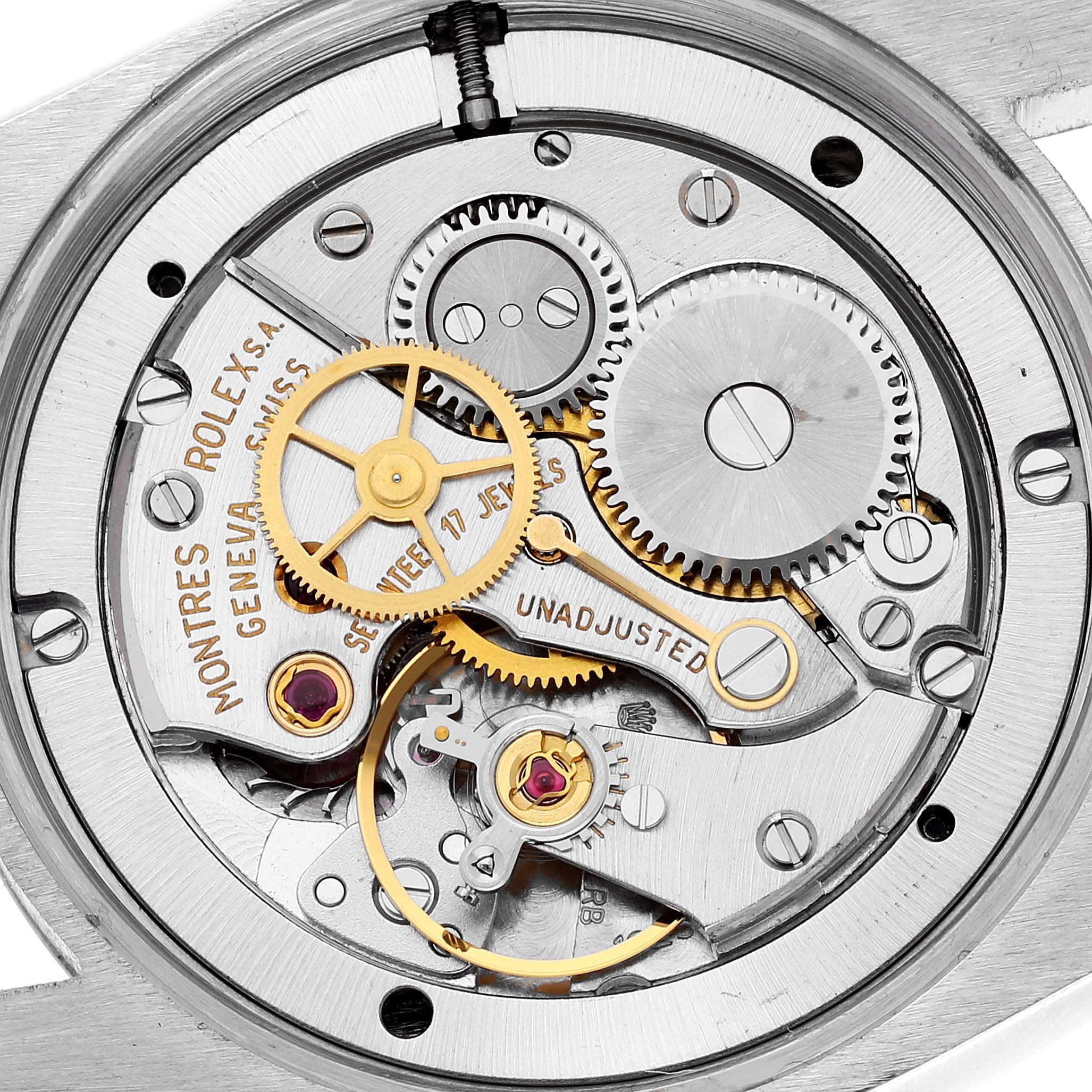 This is a close-up view of the Rolex Vintage Collection 6694 Men's Stainless Steel Black Dial 6694 Men's Stainless Steel Black Dial watch's inner mechanical movement showcasing gears and jewels.