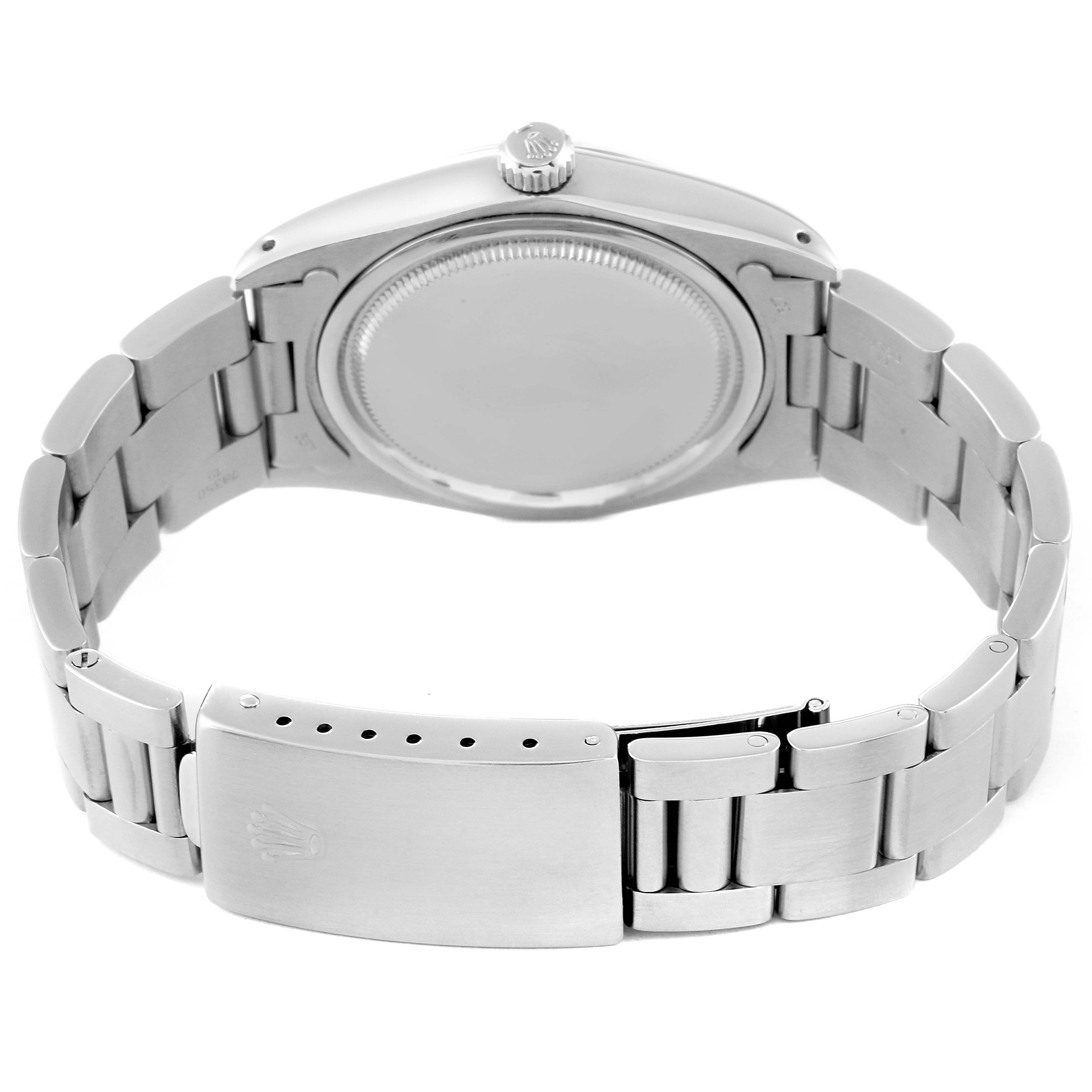 The image shows the back view of the Rolex Vintage Collection 6694 Men's Stainless Steel Black Dial 6694 Men's Stainless Steel Black Dial watch, highlighting its bracelet and clasp.