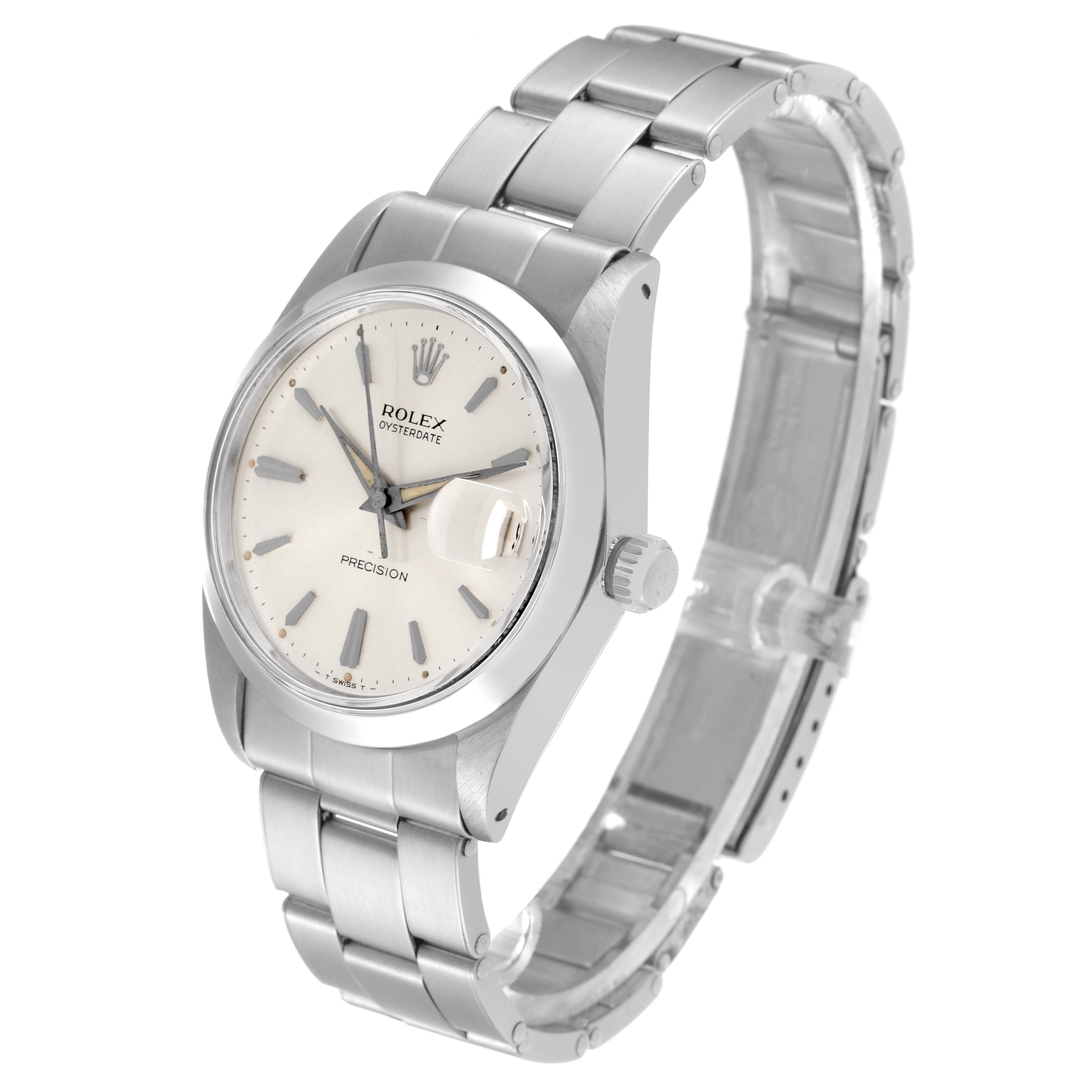 The image shows a side angle of the Rolex Vintage Collection 6694 Men's Stainless Steel Silver Dial 6694 Men's Stainless Steel Silver Dial watch, highlighting its dial, bezel, bracelet, and crown.