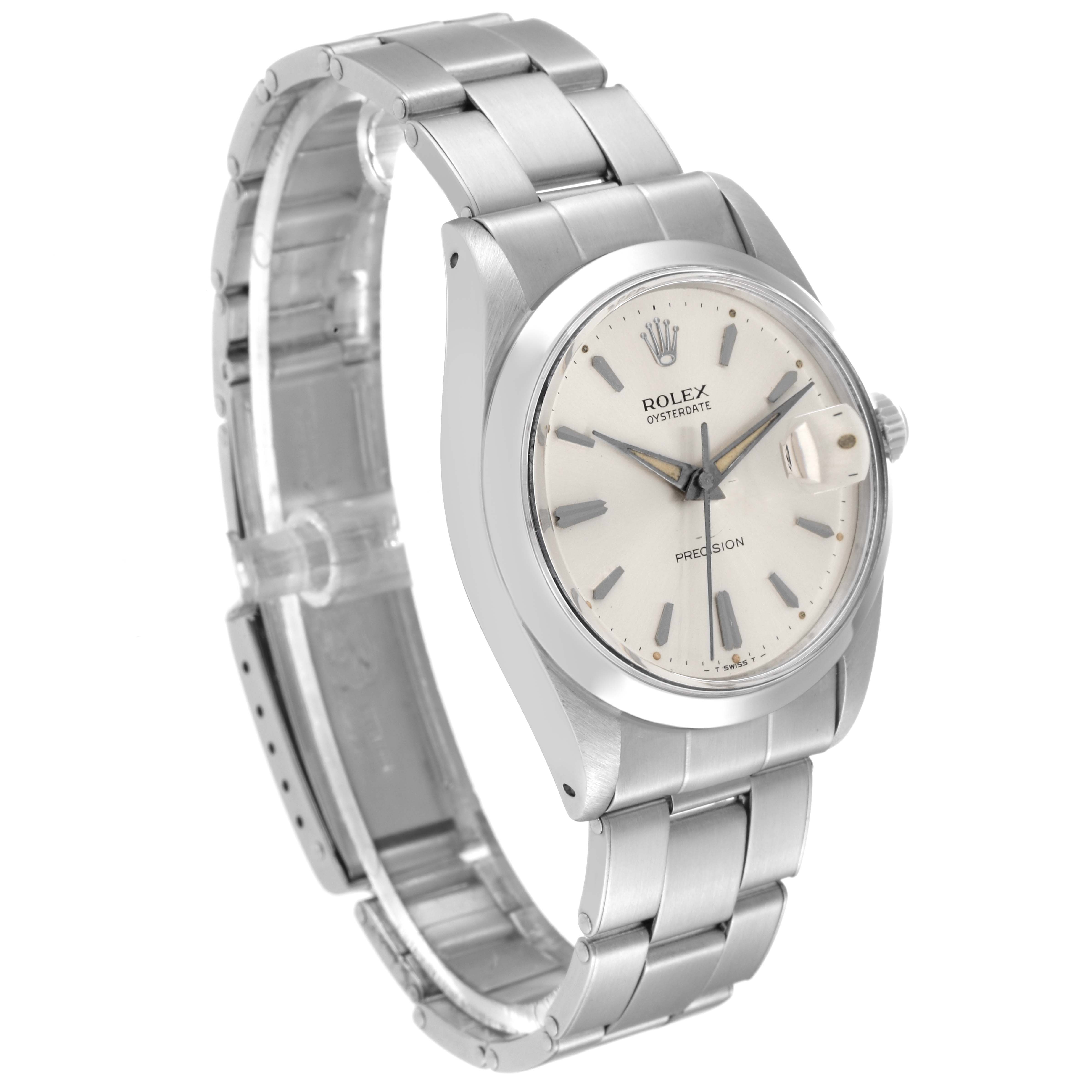 The Rolex Vintage Collection 6694 Men's Stainless Steel Silver Dial 6694 Men's Stainless Steel Silver Dial watch is shown at a diagonal angle, showcasing its stainless steel case, bracelet, and face with date magnifier.