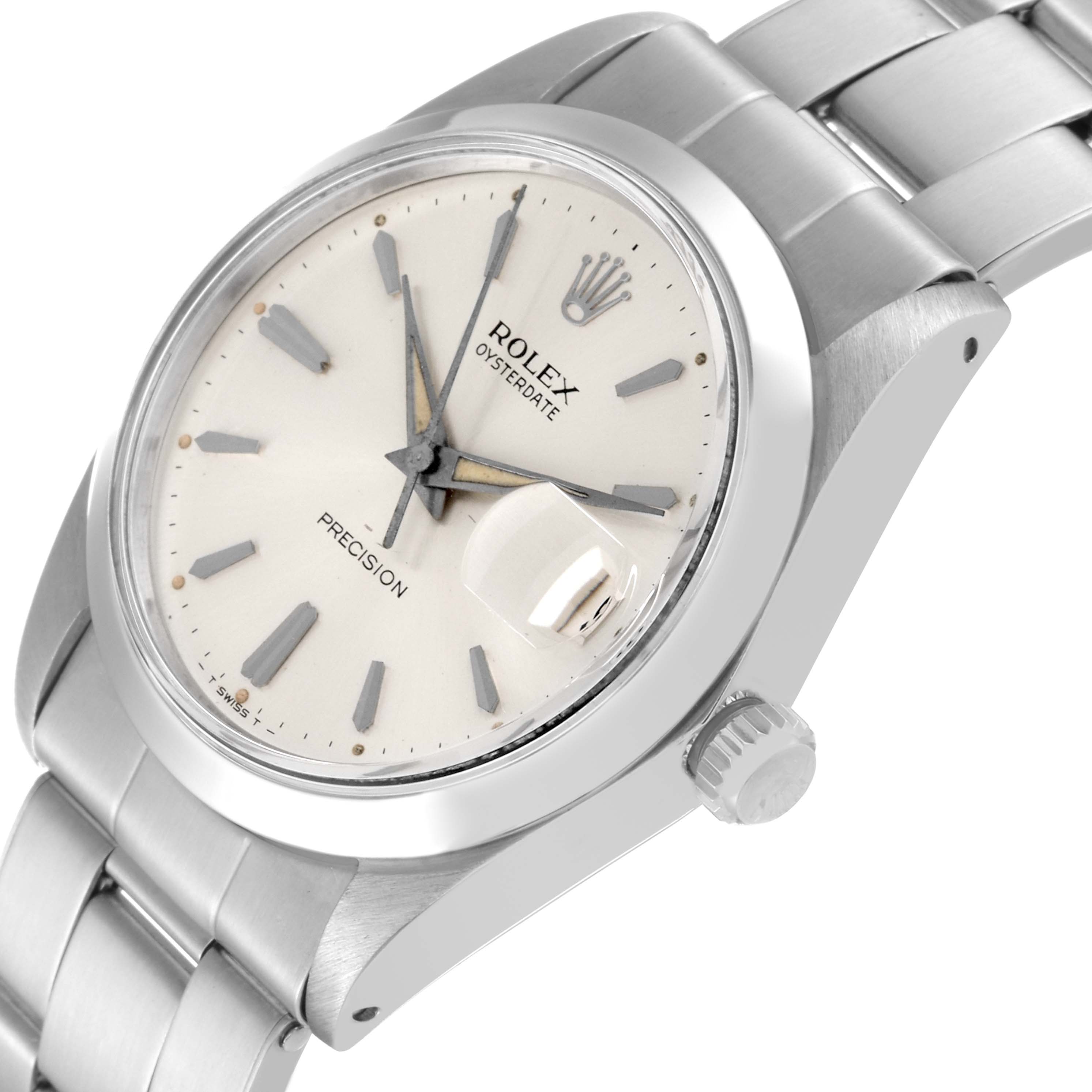 The image shows a Rolex Vintage Collection 6694 Men's Stainless Steel Silver Dial 6694 Men's Stainless Steel Silver Dial Oysterdate watch from a front-side angle, highlighting its dial, crown, and bracelet.