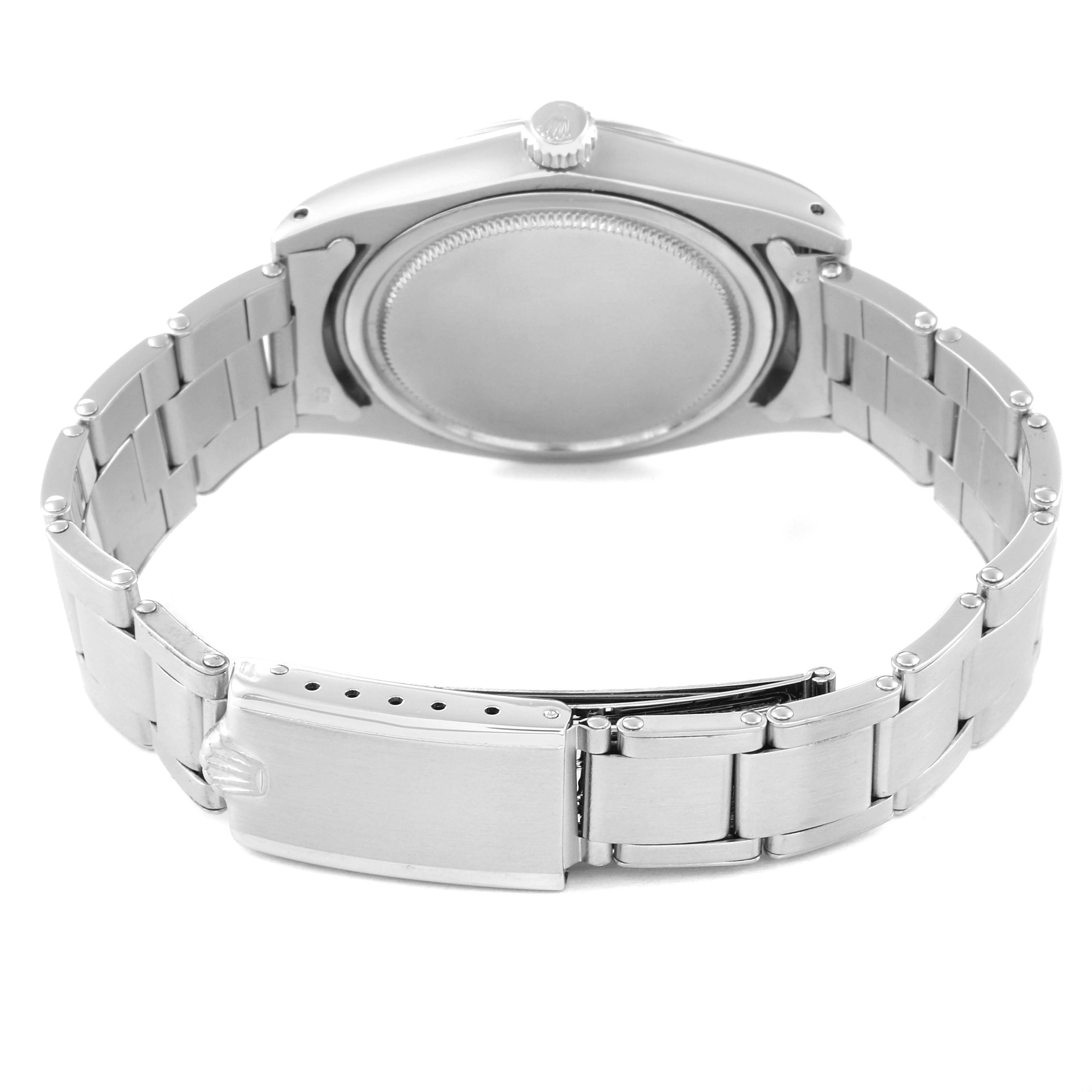 This image shows the back case and bracelet of a Rolex Vintage Collection 6694 Men's Stainless Steel Silver Dial 6694 Men's Stainless Steel Silver Dial watch from a rear angle.