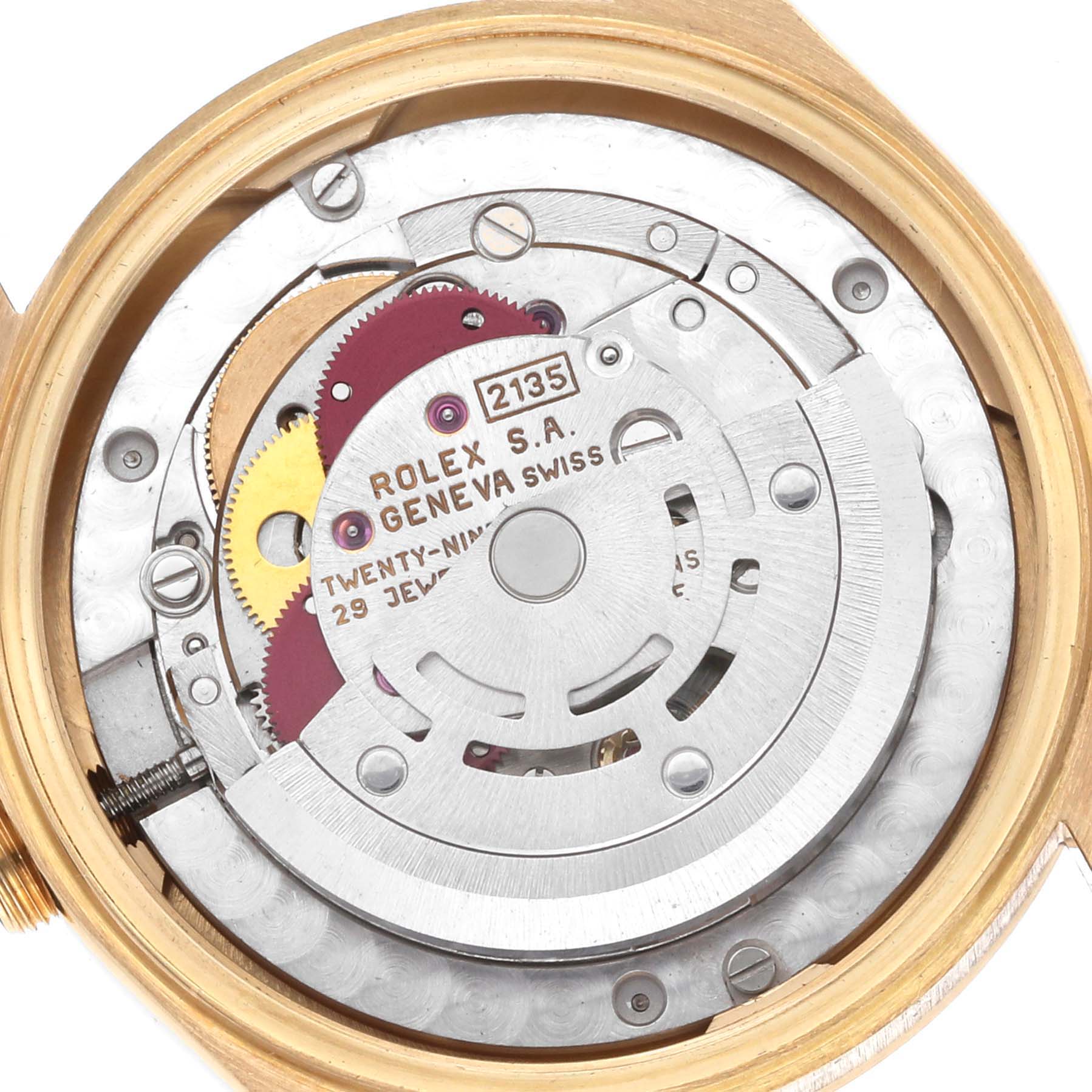 The image shows the internal movement of a Rolex President 68278 Women's Yellow Gold Silver Dial watch from a top-down angle, highlighting the gears and rotor.