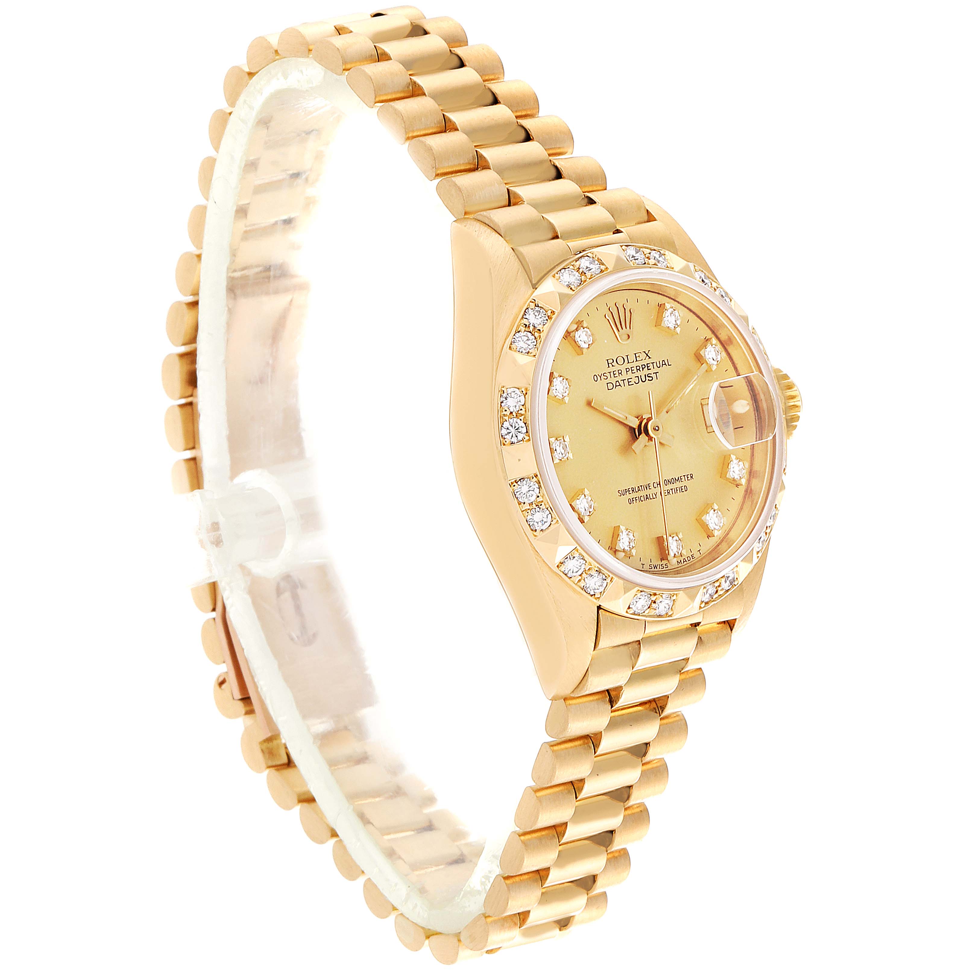 This image shows a Rolex President 69258 Women
s Yellow Gold Champagne Dial 69258 Women
s Yellow Gold Champagne Dial model watch at a slight side angle, detailing its gold bracelet, diamond bezel, and dial.