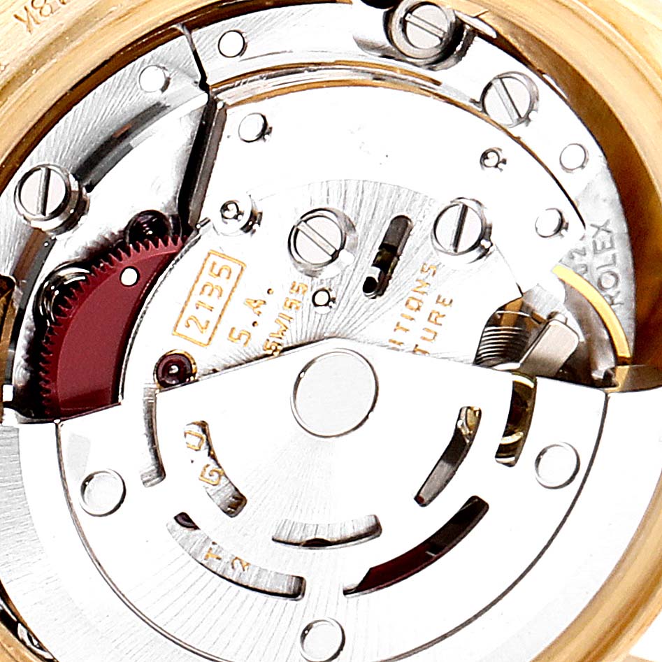 This image shows a detailed close-up of the internal mechanism of a Rolex President 69258 Women
s Yellow Gold Champagne Dial 69258 Women
s Yellow Gold Champagne Dial model watch.