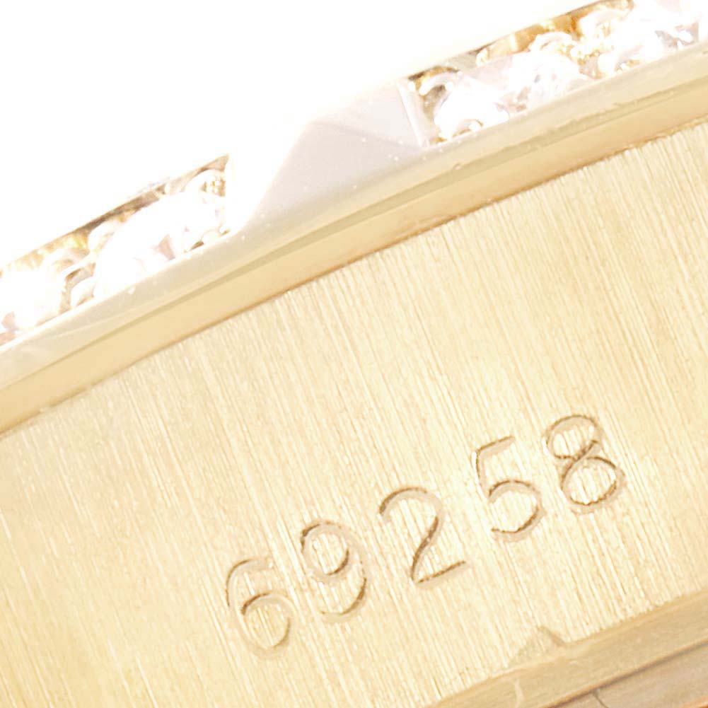 This image shows a close-up of the model number engraving "69258" on the case of a Rolex President 69258 Women
s Yellow Gold Champagne Dial 69258 Women
s Yellow Gold Champagne Dial watch.
