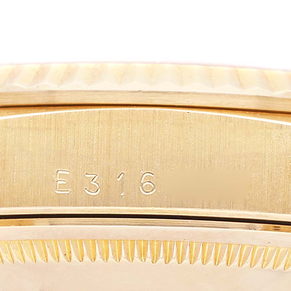 The image shows a close-up of the case back engraving on a Rolex President 18238 Men
s Yellow Gold Champagne Dial 18238 Men
s Yellow Gold Champagne Dial model watch.