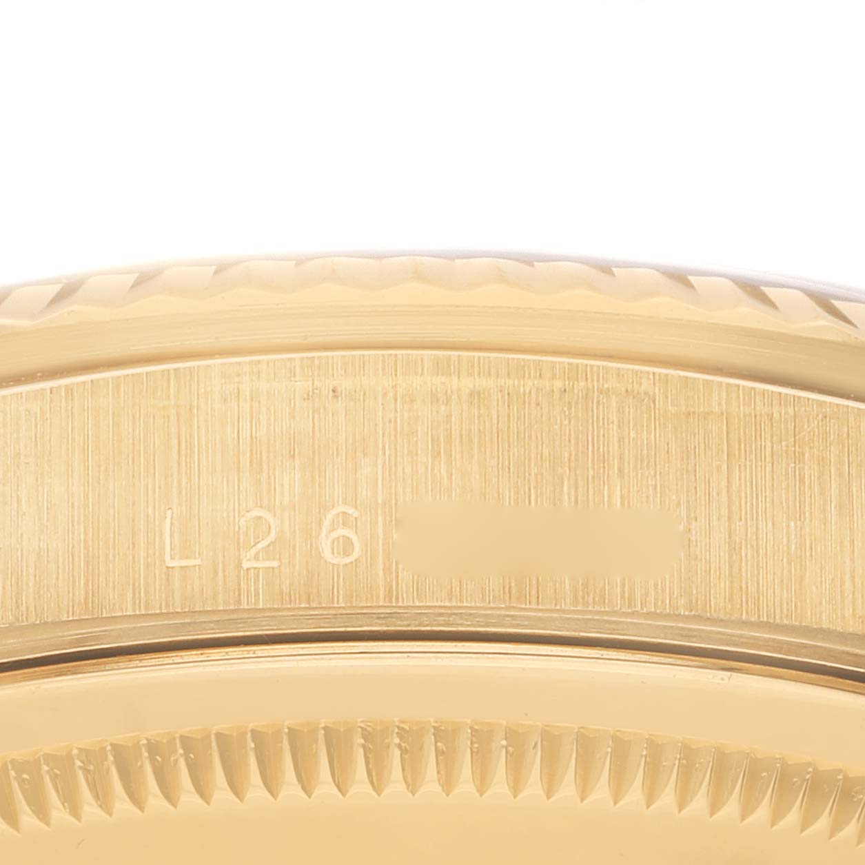 This image shows a close-up of the case and part of the bezel of a Rolex President 18238 Men's Yellow Gold Black Dial 18238 Men's Yellow Gold Black Dial model watch.