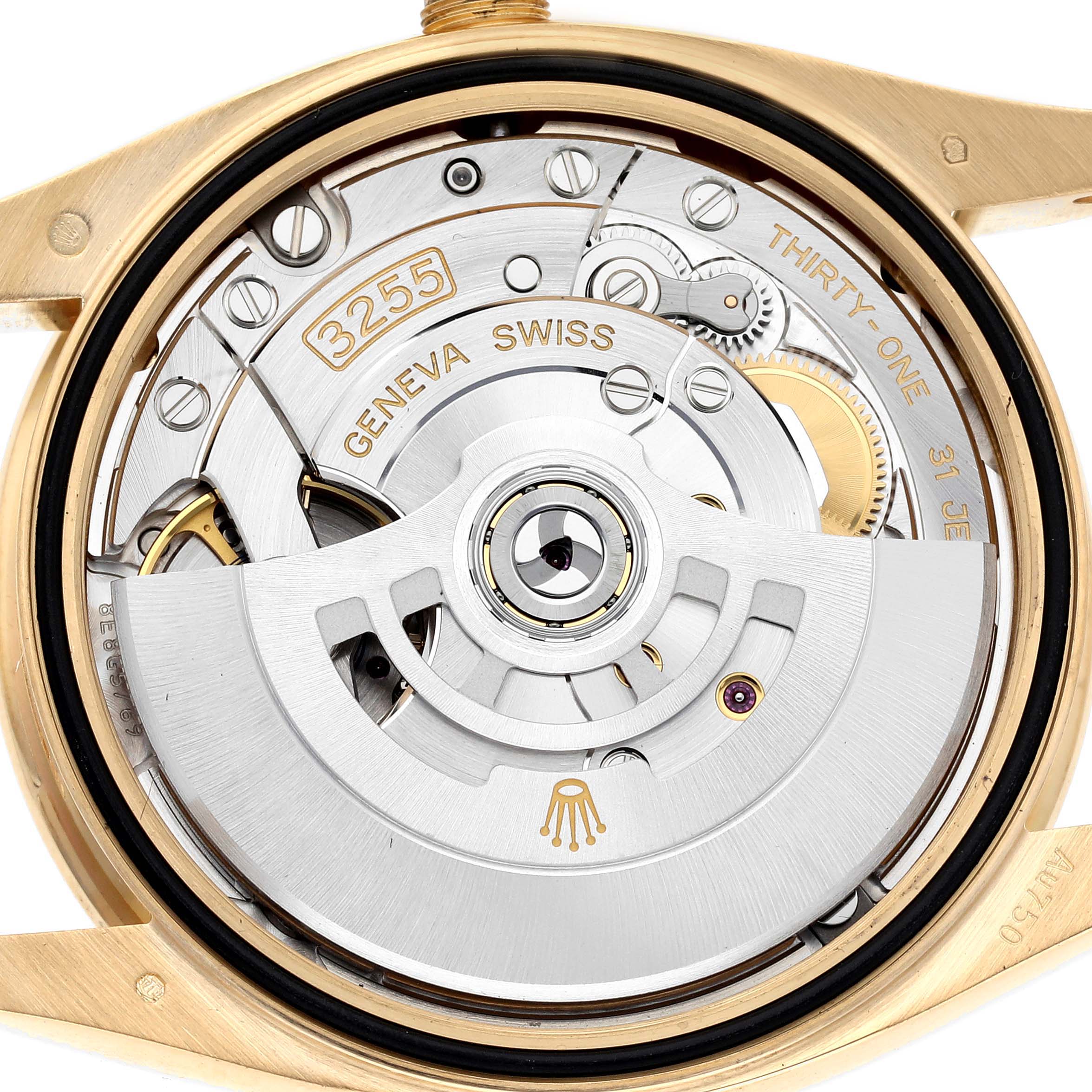 The image shows the Rolex President 128348 Men's Yellow Gold Champagne Dial 128348 Men's Yellow Gold Champagne Dial model's movement, viewed from the back, highlighting its intricate mechanical parts.