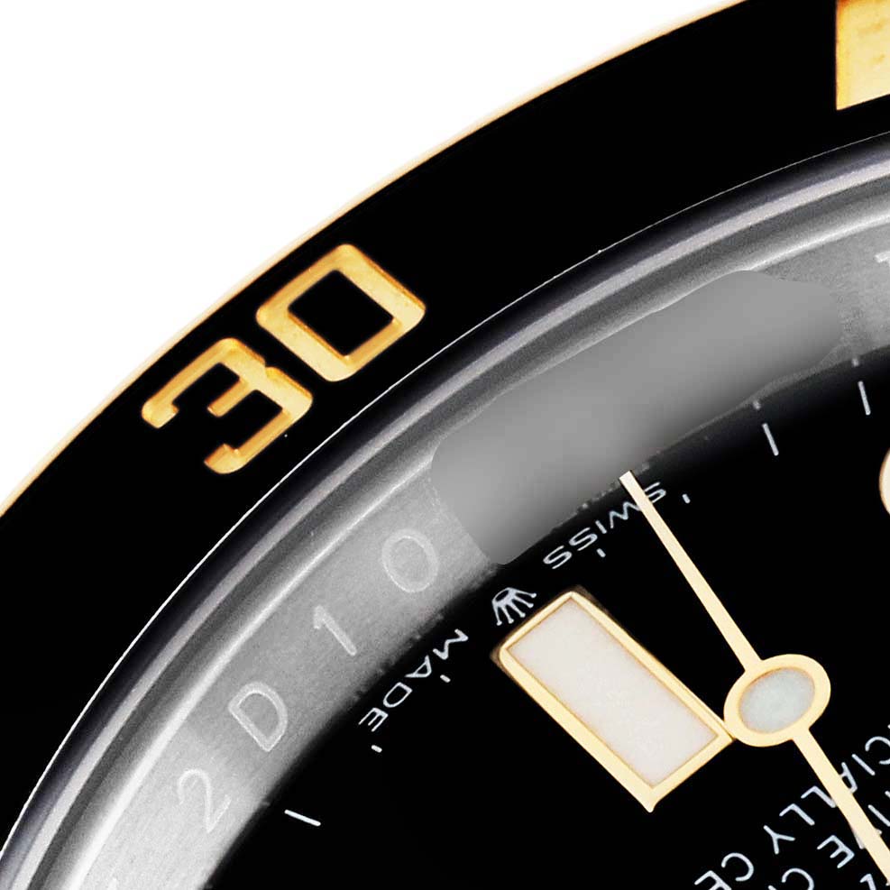 The image shows a close-up of the dial and bezel of a Rolex Submariner 126613 Men's Steel and Gold (two tone) Black Dial 126613 Men's Steel and Gold (two tone) Black Dial, highlighting the "30" marking and part of the minute hand.
