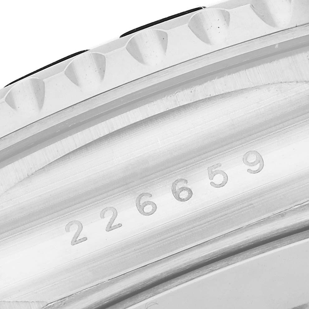 The image shows a close-up angle of the Rolex Yacht-Master 226659 Men's White Gold Black Dial 226659 Men's White Gold Black Dial's case with visible model numbers engraved.