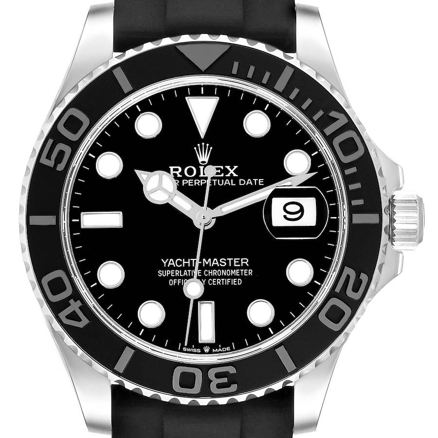 The Rolex Yacht-Master watch is shown from the front, displaying the dial, bezel, and crown with a rubber strap.