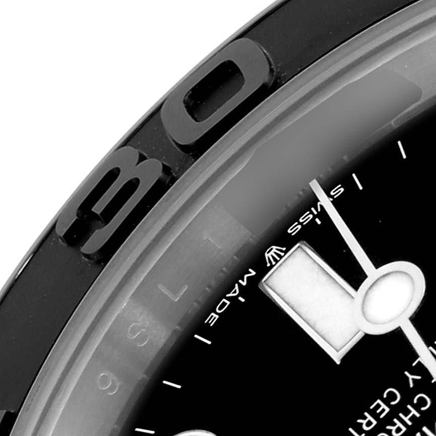 The image shows a close-up of the bezel and part of the dial of the Rolex Yacht-Master 226659 Men's White Gold Black Dial 226659 Men's White Gold Black Dial watch.