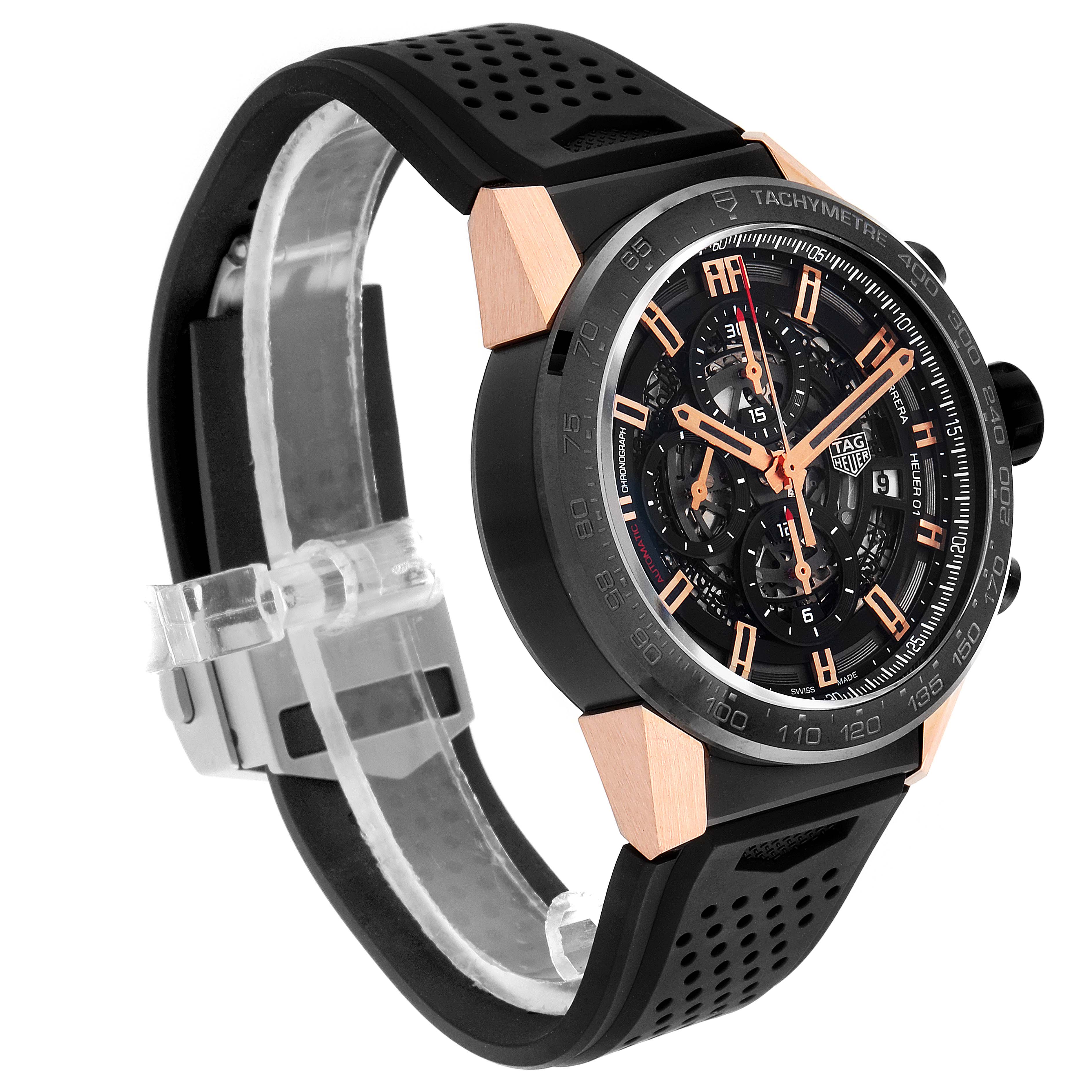 The image shows a Tag Heuer Carrera CAR205A.FT6087 Men's Titanium Black Dial CAR205A.FT6087 Men's Titanium Black Dial watch at a three-quarter angle, highlighting its black strap, dial, and rose gold accents.