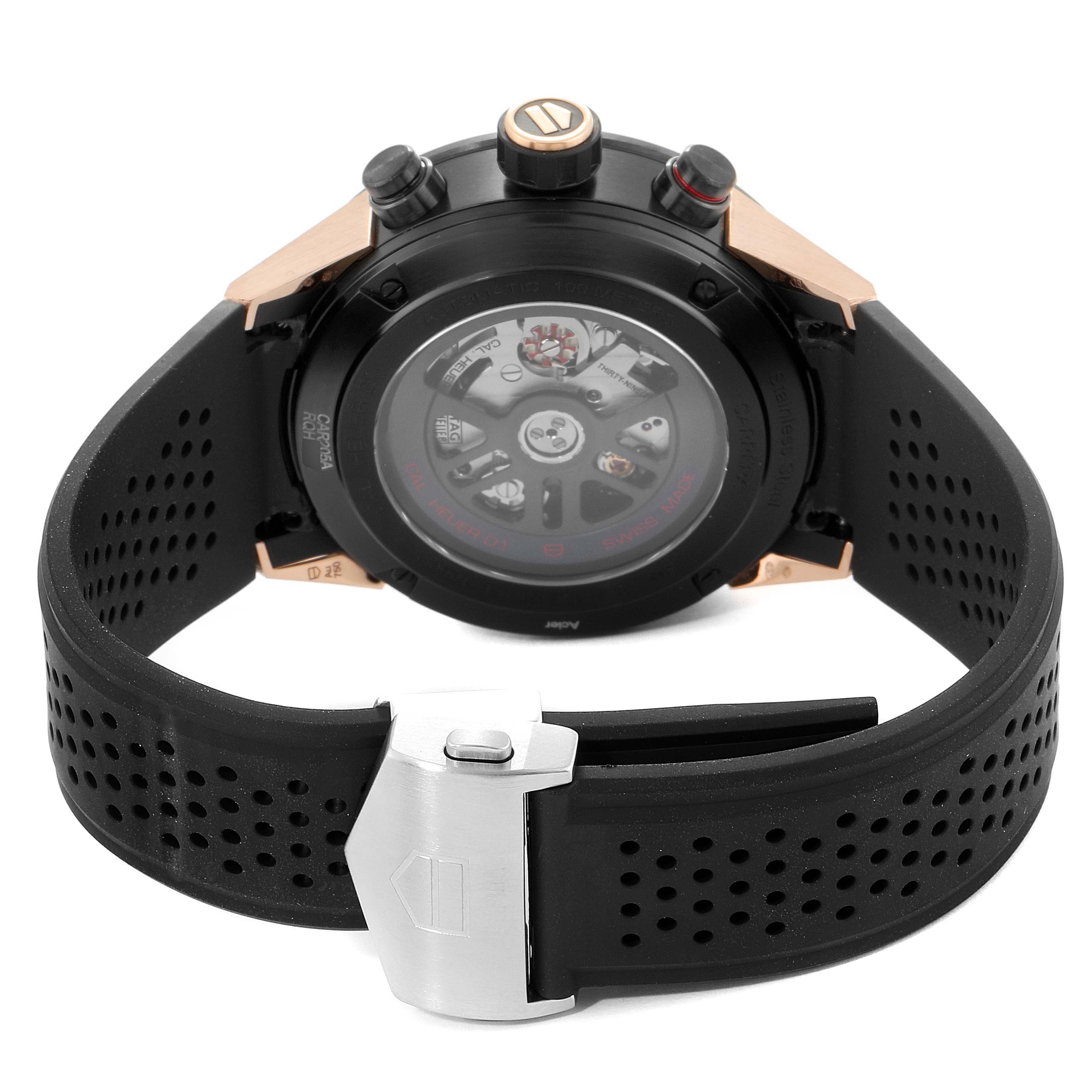 The image shows the back case and strap of a Tag Heuer Carrera CAR205A.FT6087 Men's Titanium Black Dial CAR205A.FT6087 Men's Titanium Black Dial watch, highlighting its movement and clasp.