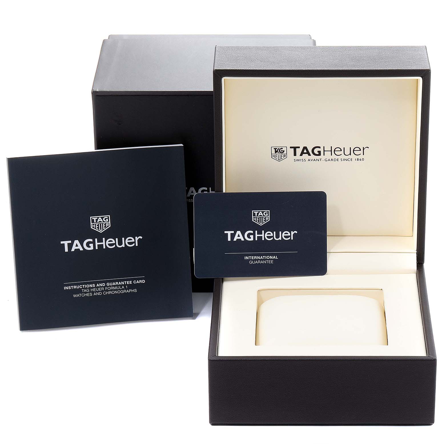 The image shows the box, instruction manual, and guarantee card for a Tag Heuer Carrera CAR205A.FT6087 Men's Titanium Black Dial CAR205A.FT6087 Men's Titanium Black Dial watch.