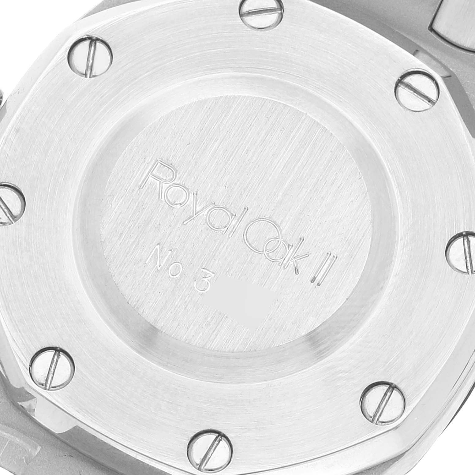 This image shows the case back of an Audemars Piguet Royal Oak Women's Stainless Steel Black Dial Women's Stainless Steel Black Dial watch, highlighting the engravings and screws.