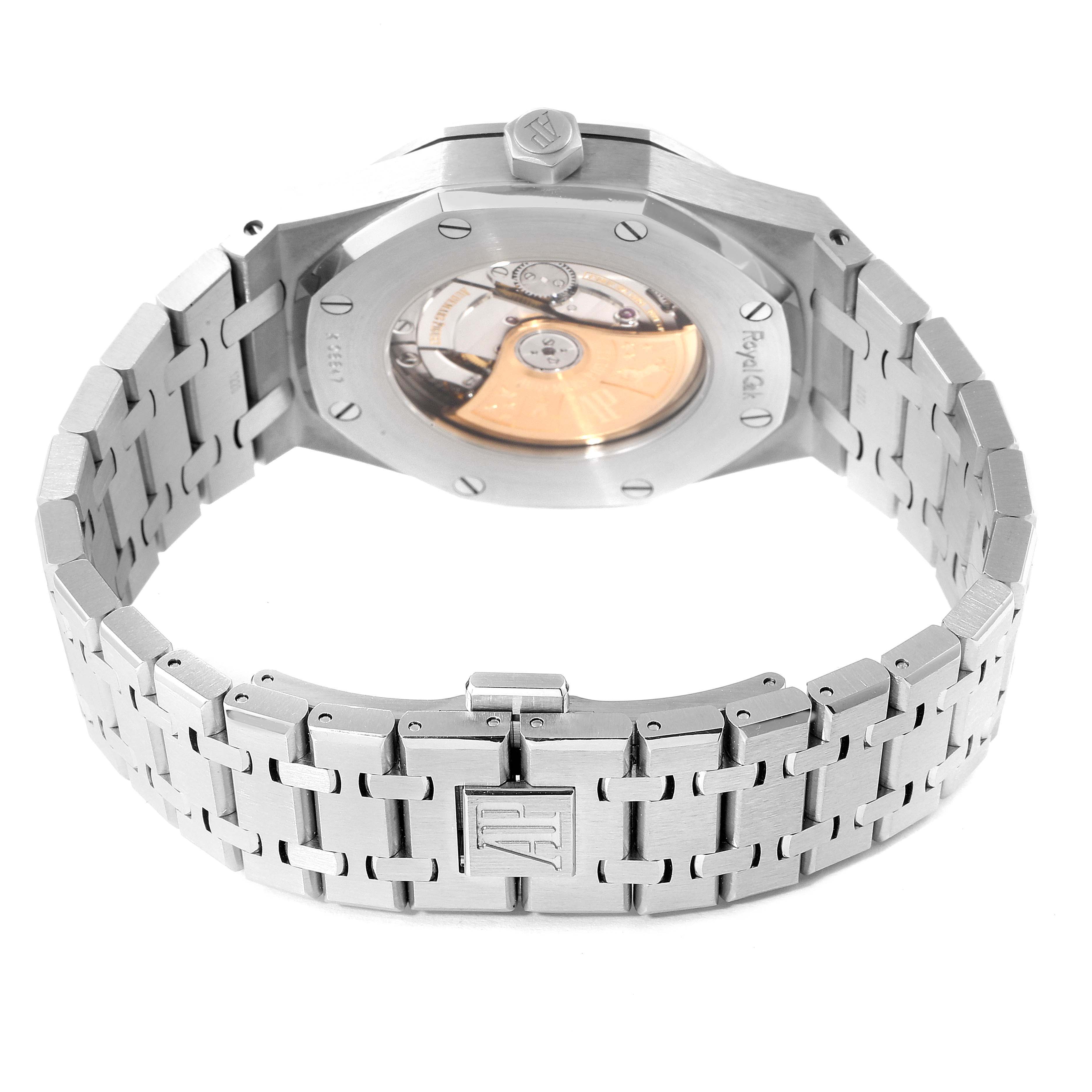 The image shows the back view of an Audemars Piguet Royal Oak 15400ST.OO.1220ST.03 Men's Stainless Steel Blue Dial 15400ST.OO.1220ST.03 Men's Stainless Steel Blue Dial watch, showcasing the open case back and part of the stainless steel bracelet.