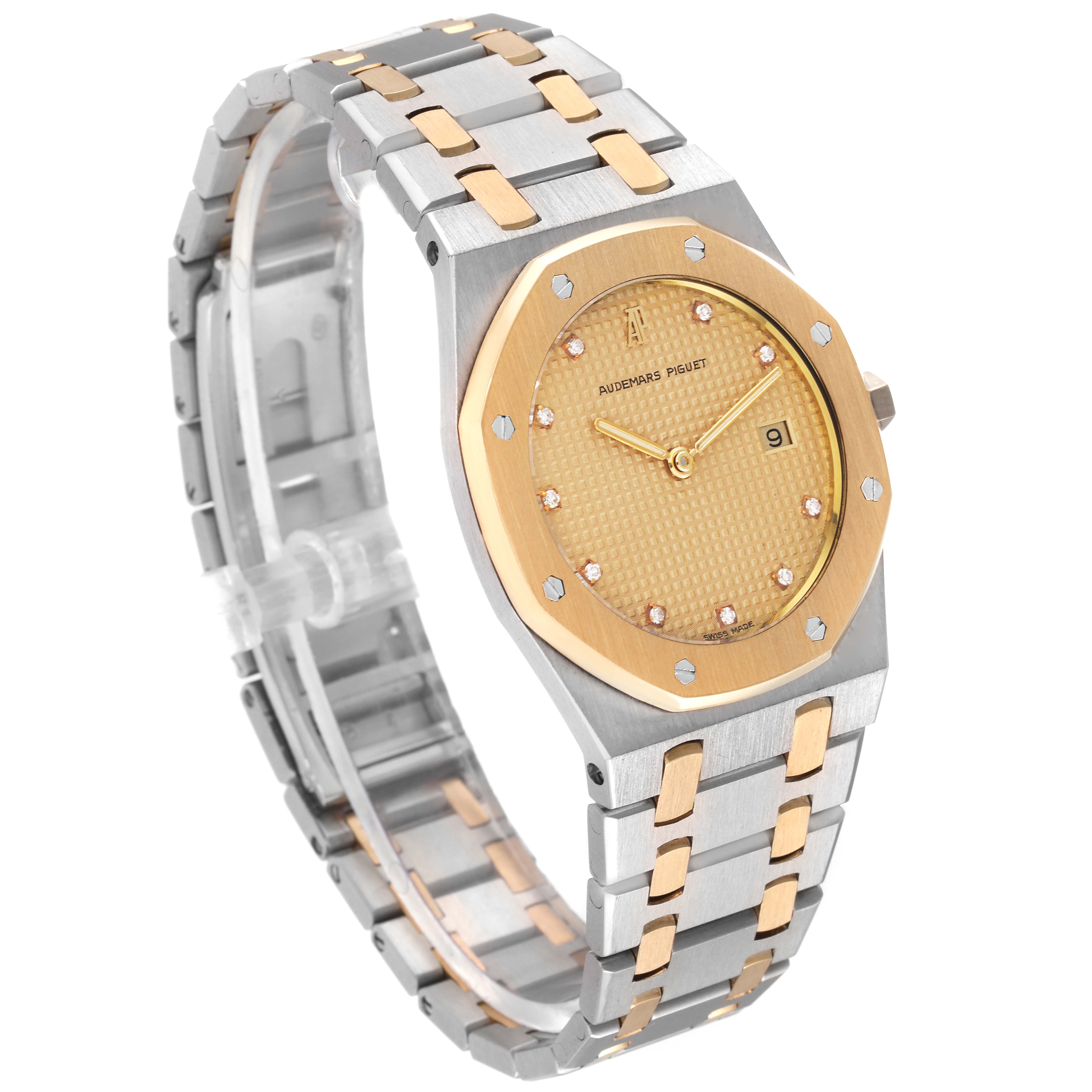 The image shows a Royal Oak model by Audemars Piguet, angled to display the dial, bezel, and two-tone bracelet.