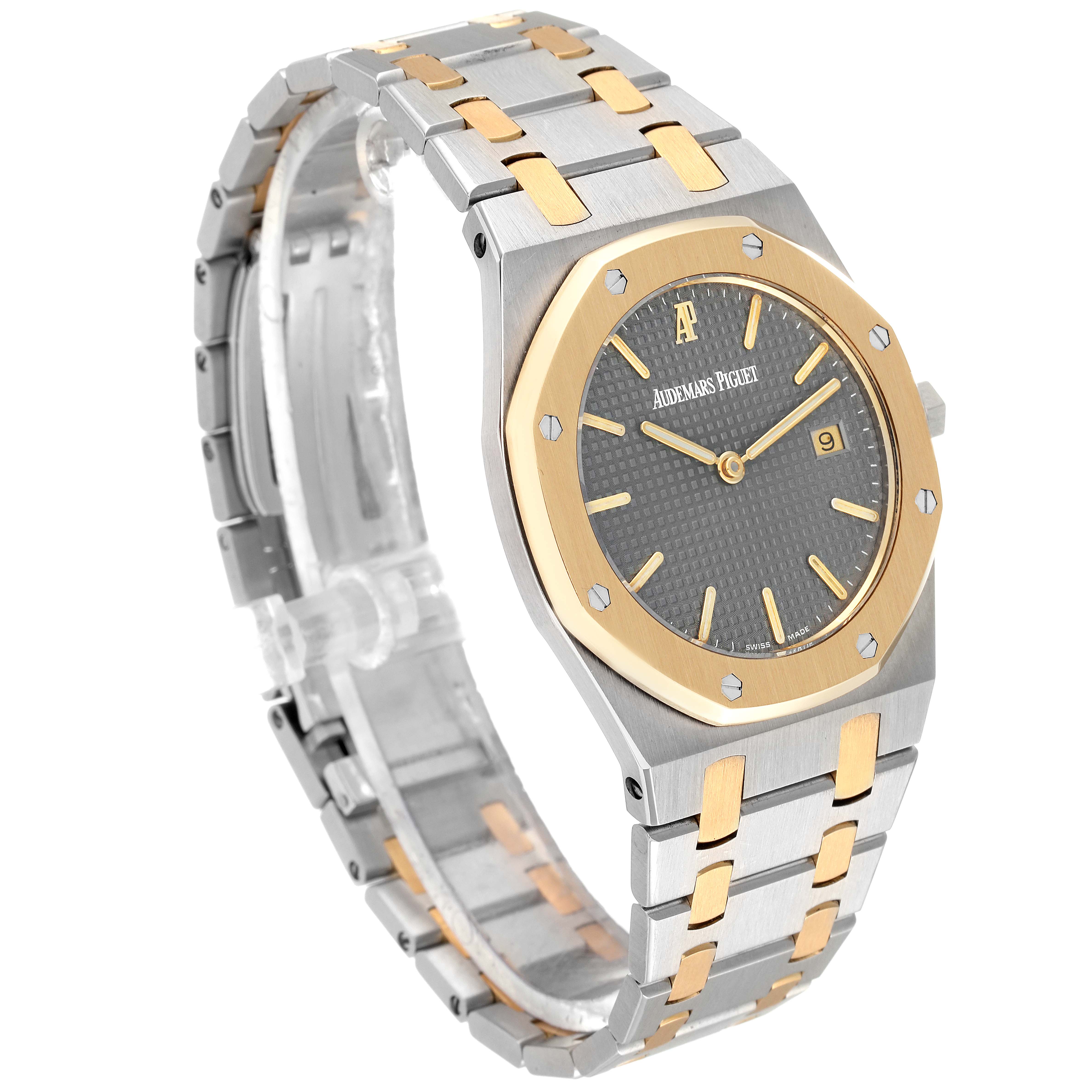 The image shows a side angle view of the Audemars Piguet Royal Oak 56175SA.OO.0789SA.01 Men's Steel and Gold (two tone) Grey Dial 56175SA.OO.0789SA.01 Men's Steel and Gold (two tone) Grey Dial watch, highlighting its case, bezel, dial, and bracelet.