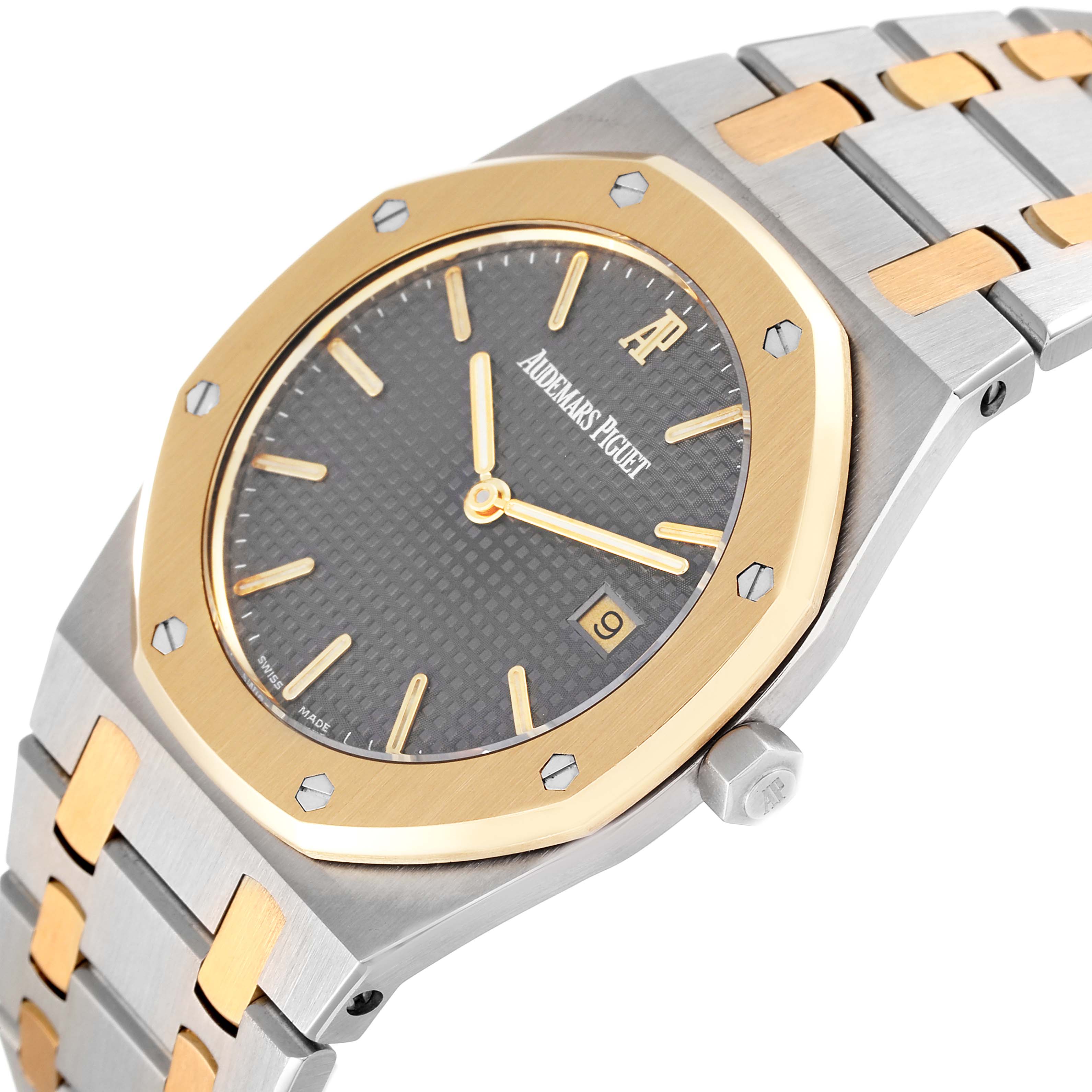 The image shows a close-up, angled view of the Audemars Piguet Royal Oak 56175SA.OO.0789SA.01 Men's Steel and Gold (two tone) Grey Dial 56175SA.OO.0789SA.01 Men's Steel and Gold (two tone) Grey Dial watch, featuring its dial, bezel, and part of the bracelet.