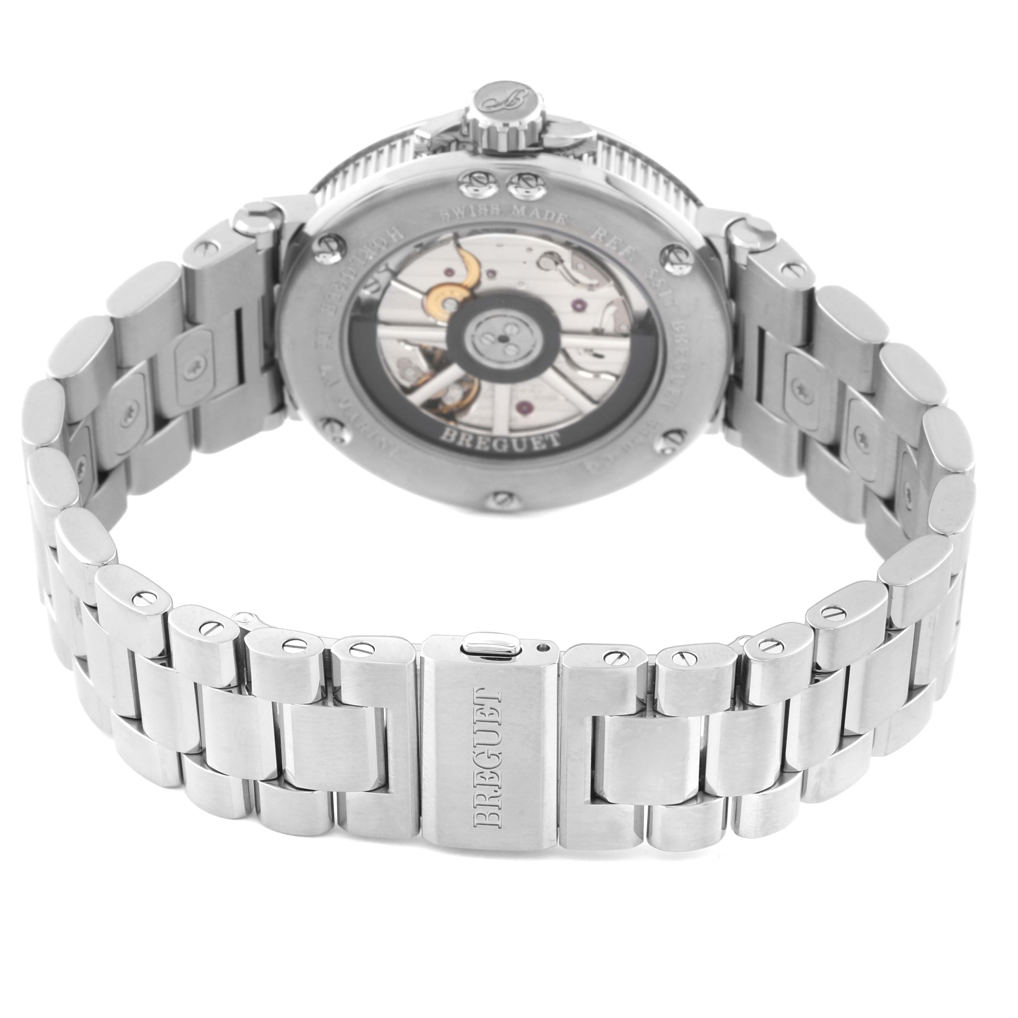 The Breguet Marine 5517TI/Y1/TZ0 Men's Titanium Blue Dial 5517TI/Y1/TZ0 Men's Titanium Blue Dial watch is shown from the back, highlighting its movement and metal bracelet.