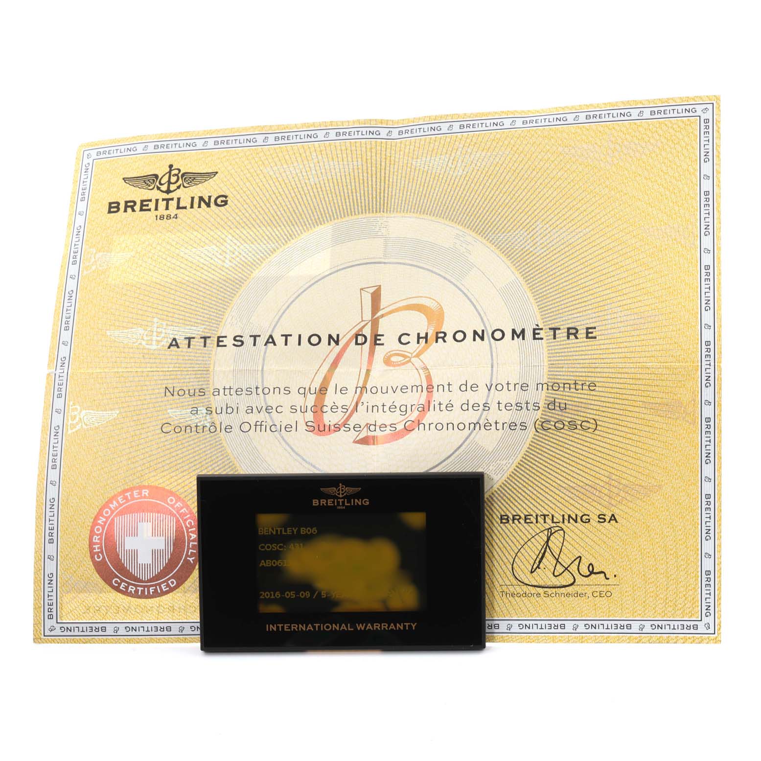 The image shows certification and an international warranty card for a Bentley model by Breitling.