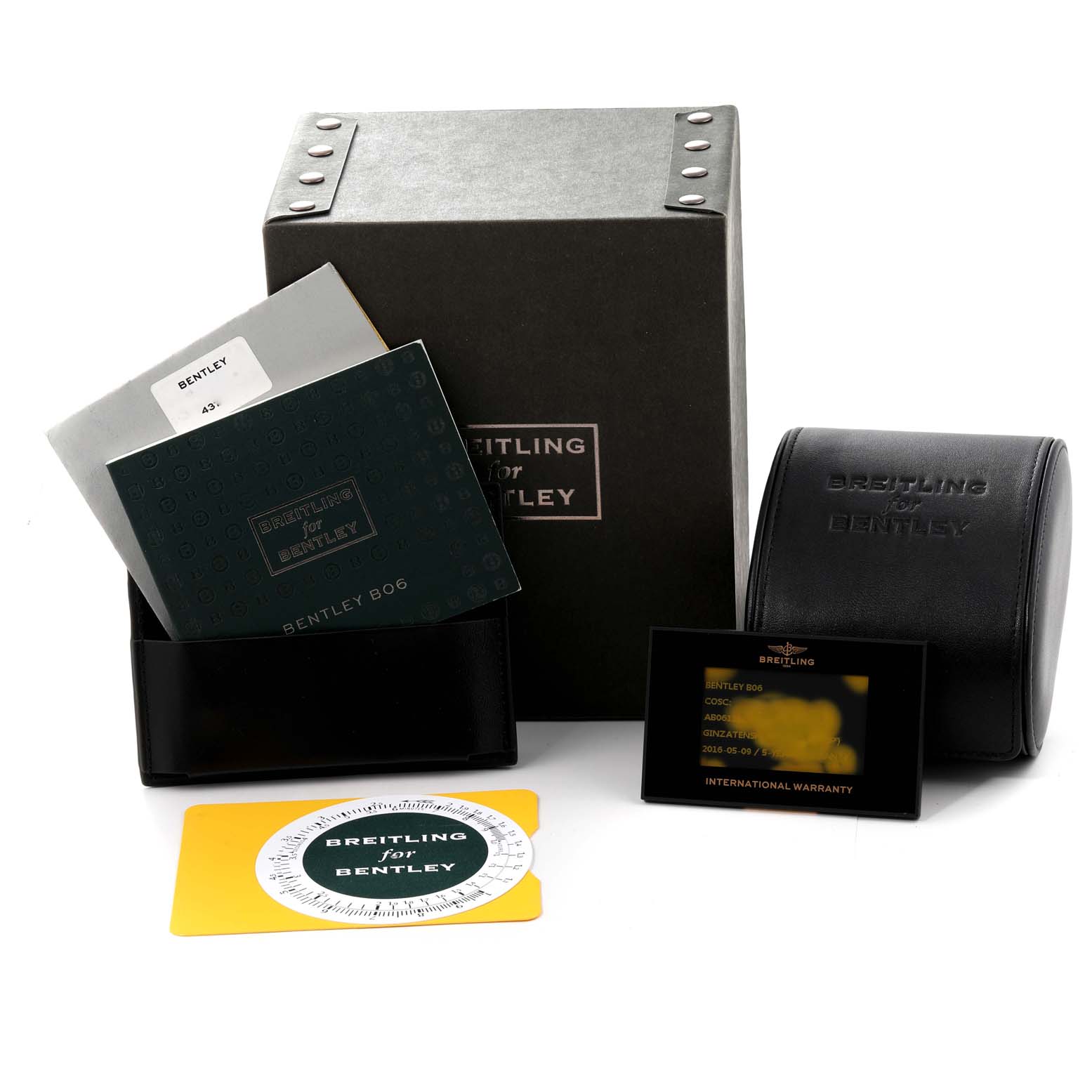 The image shows the packaging and accessories for a Breitling Bentley AB061112.BD80.990A Men's Stainless Steel Black Dial AB061112.BD80.990A Men's Stainless Steel Black Dial watch, including manuals, warranty card, and a carrying case.