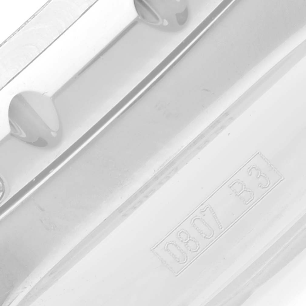 This image shows a close-up view of the bezel for the Bentley model by Breitling, focusing on its texture and engraved markings.