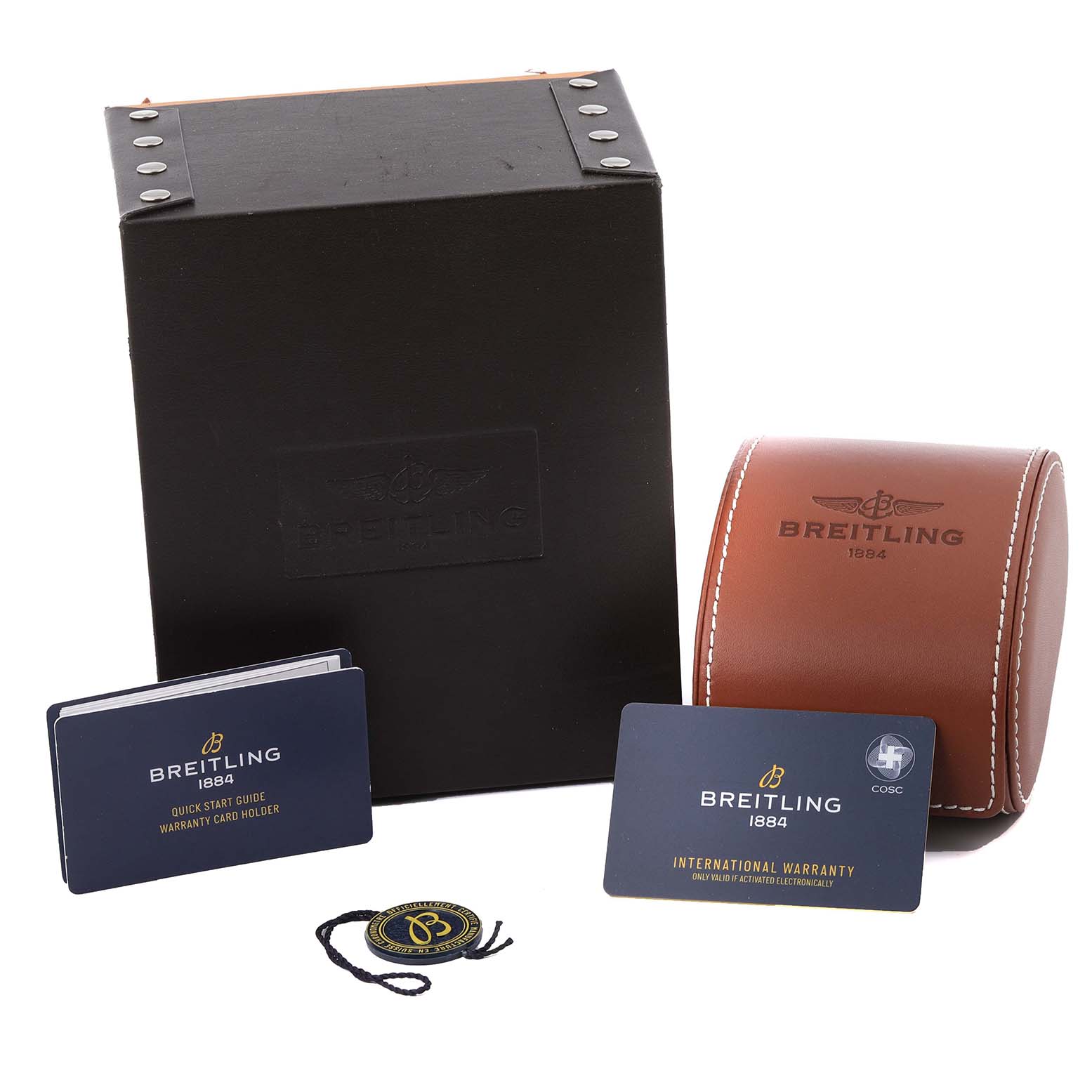 The Breitling Navitimer AB0139211L1P1 Men's Stainless Steel Green Dial AB0139211L1P1 Men's Stainless Steel Green Dial watch packaging includes a leather case, box, warranty cards, and a tag, shown from the side.