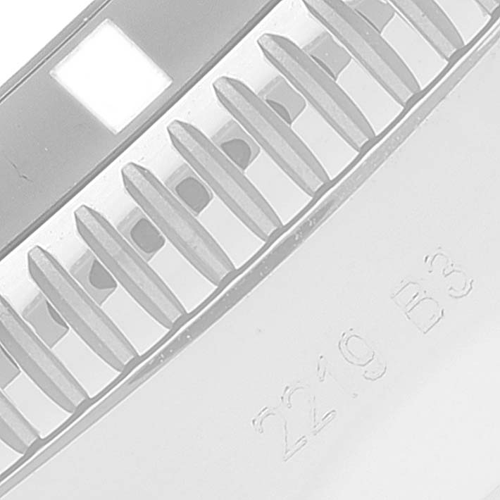 This close-up angle shows the bezel and part of the casing of the Breitling Superocean AB2010161C1A1 Men's Stainless Steel Black Dial AB2010161C1A1 Men's Stainless Steel Black Dial watch with some engraved numbers.