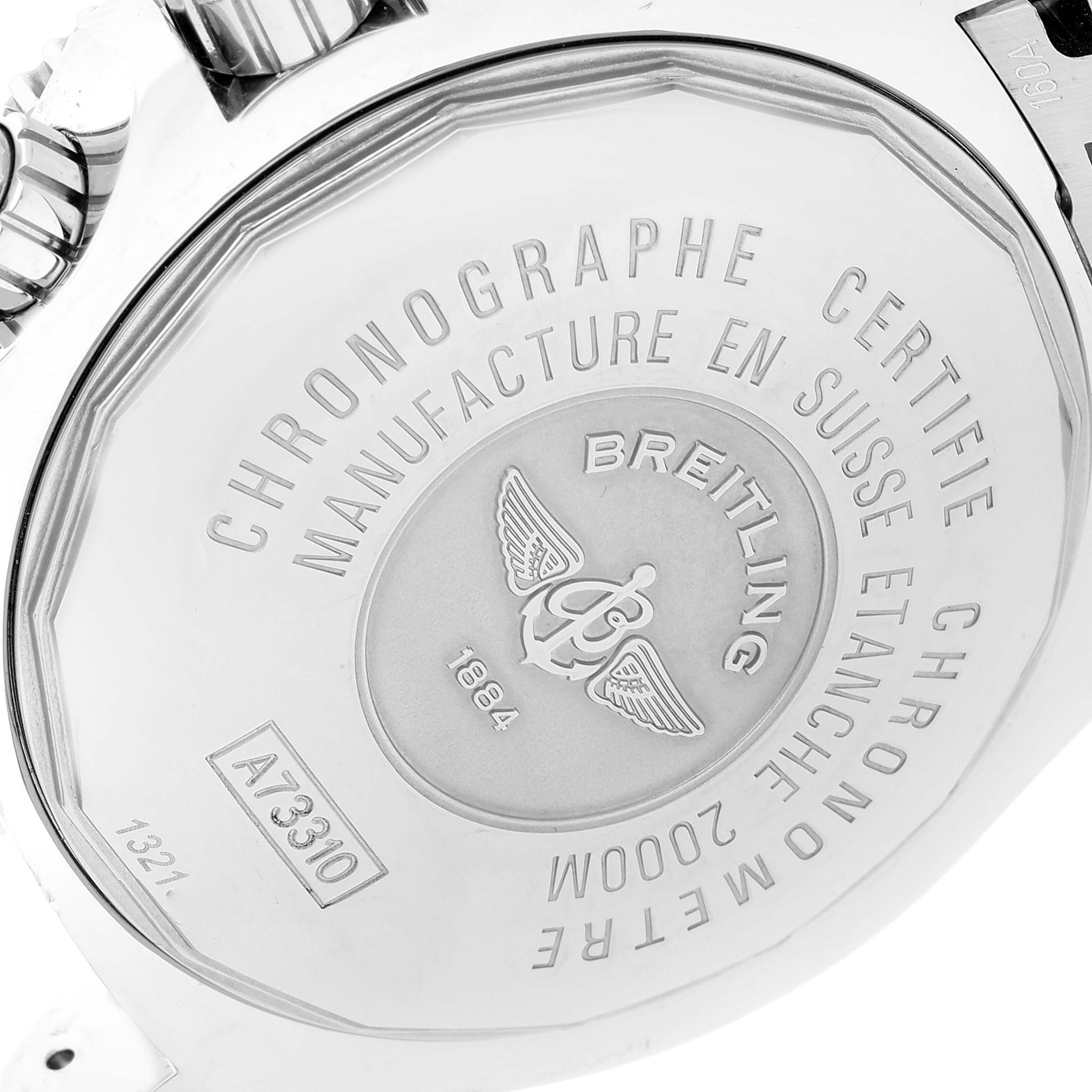 The image shows the back of a Breitling Superocean A73310 Men's Stainless Steel Black Dial A73310 Men's Stainless Steel Black Dial watch, highlighting the engraved details and crown.