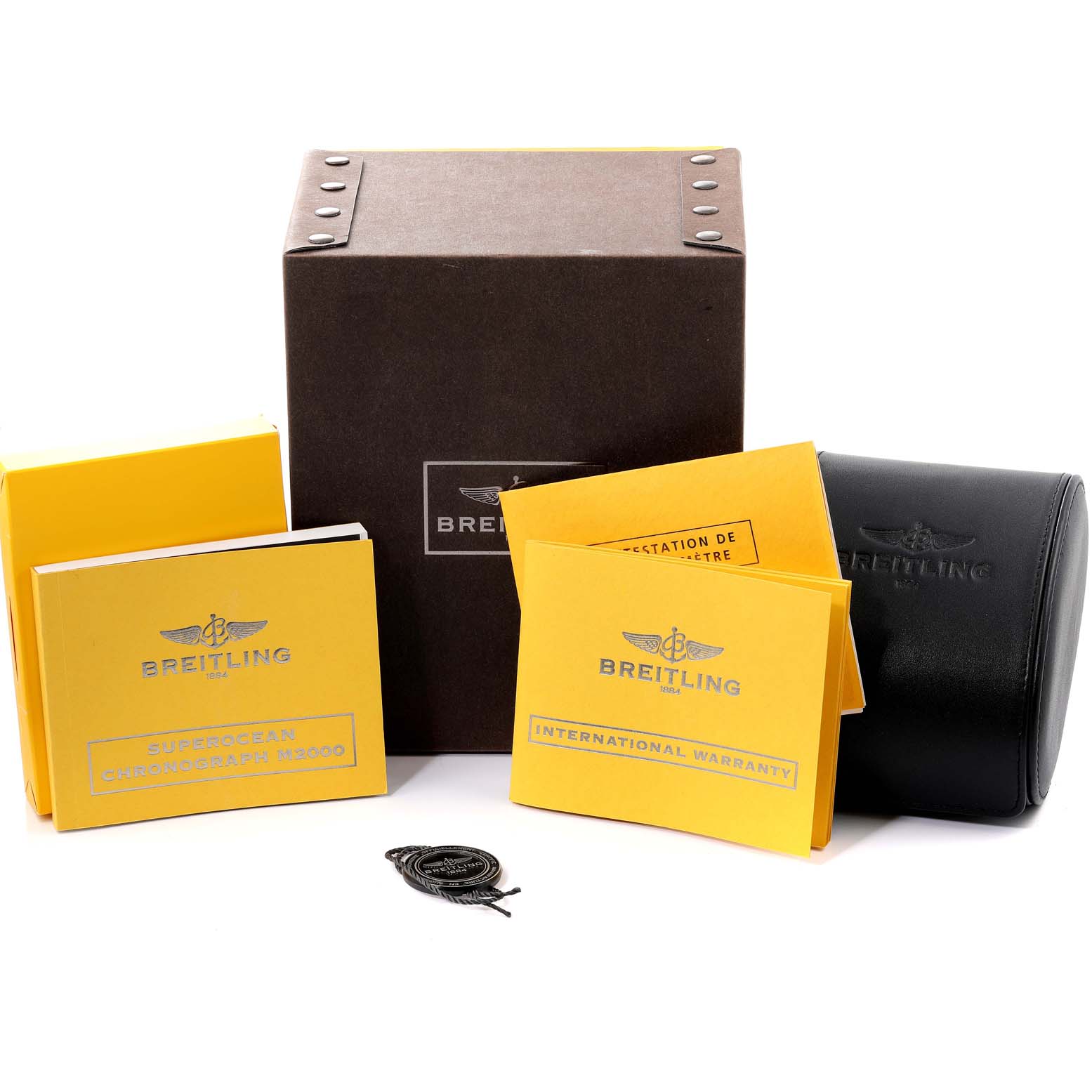 The image shows the packaging, booklet, warranty card, and a case for the Breitling Superocean A73310 Men's Stainless Steel Black Dial A73310 Men's Stainless Steel Black Dial watch.