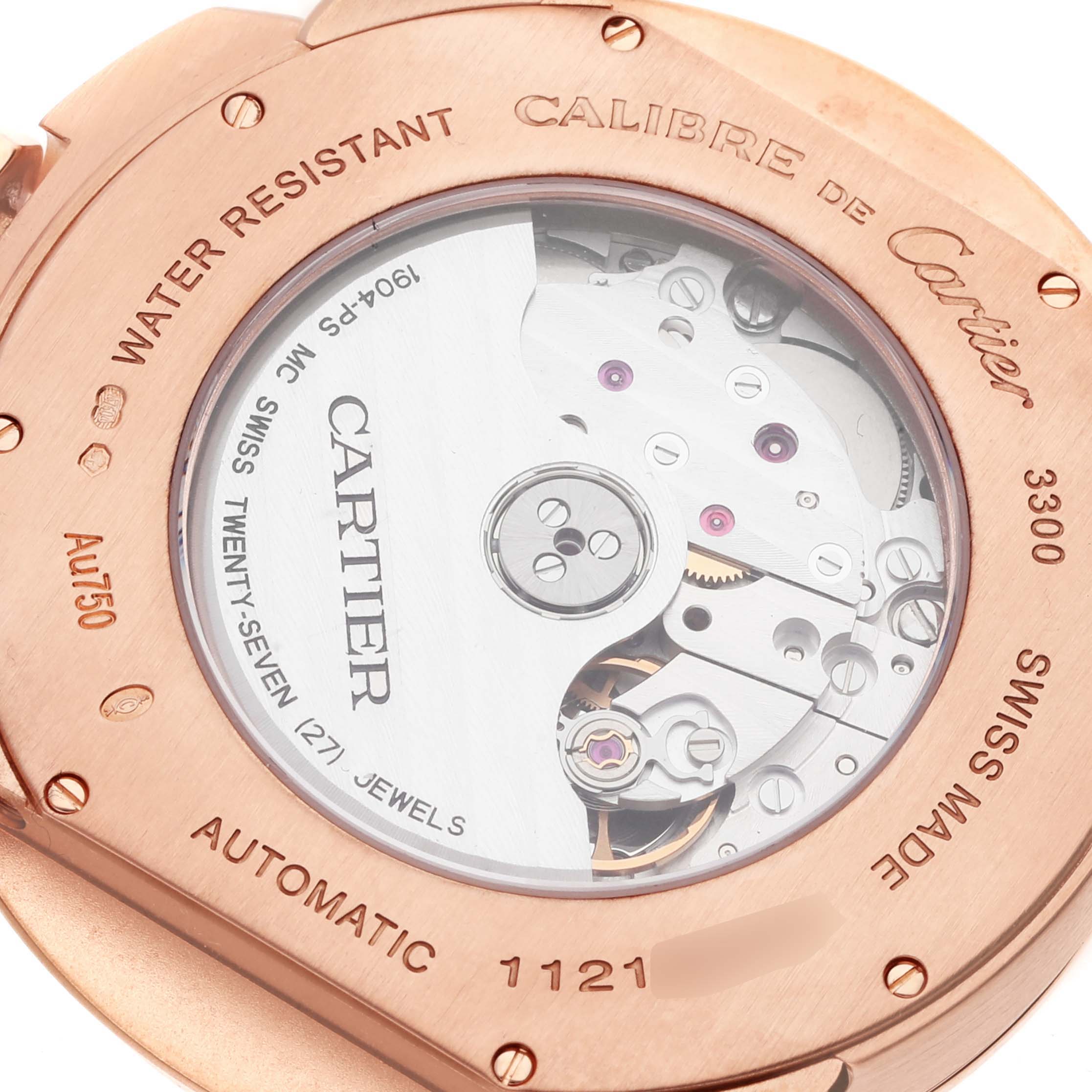 The image shows the back of a Calibre de Cartier watch by Cartier, highlighting the automatic movement and detailing.