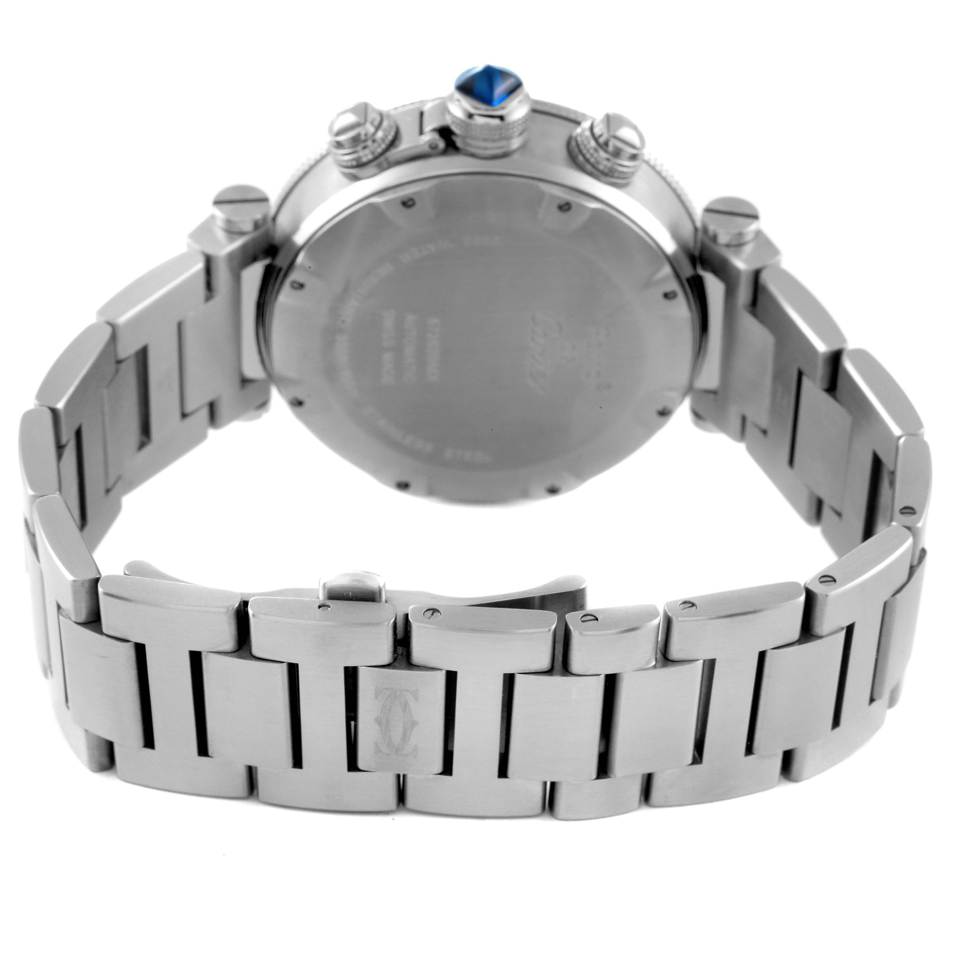 The image shows the back and side of a Cartier Pasha W31089M7 Men
s Stainless Steel Silver Dial watch, highlighting the bracelet and the crown with a blue cabochon.