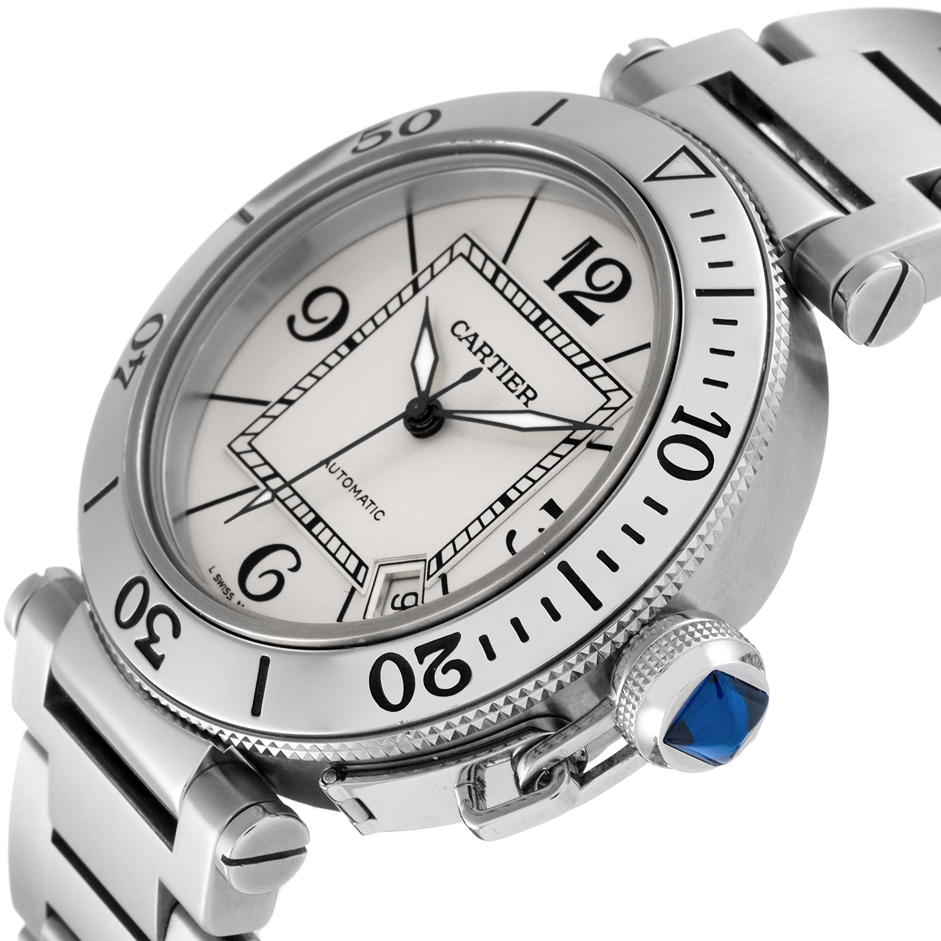 This Cartier Pasha W31080M7 Men's Stainless Steel Silver Dial W31080M7 Men's Stainless Steel Silver Dial watch is shown at an angle highlighting the face, bezel, crown with a blue gem, and part of the bracelet.