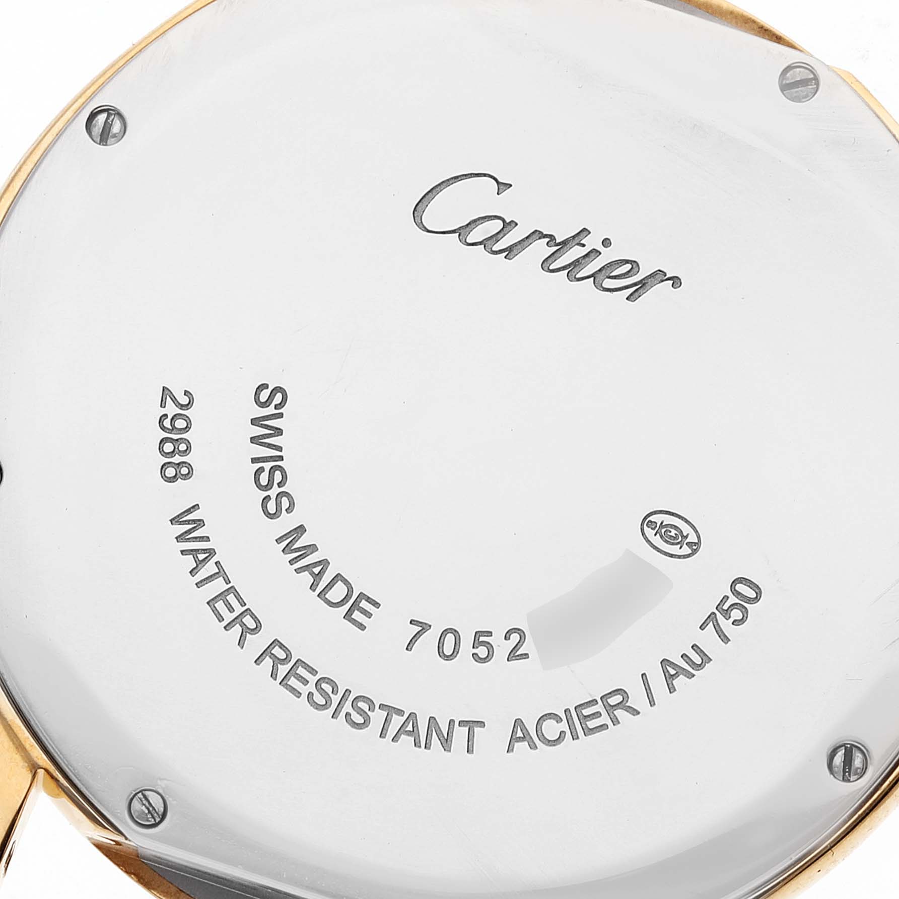The image shows the back case of the Cartier Ronde W6700455 Men
s Yellow Gold Silver Dial W6700455 Men
s Yellow Gold Silver Dial watch, highlighting its engraving and screws.