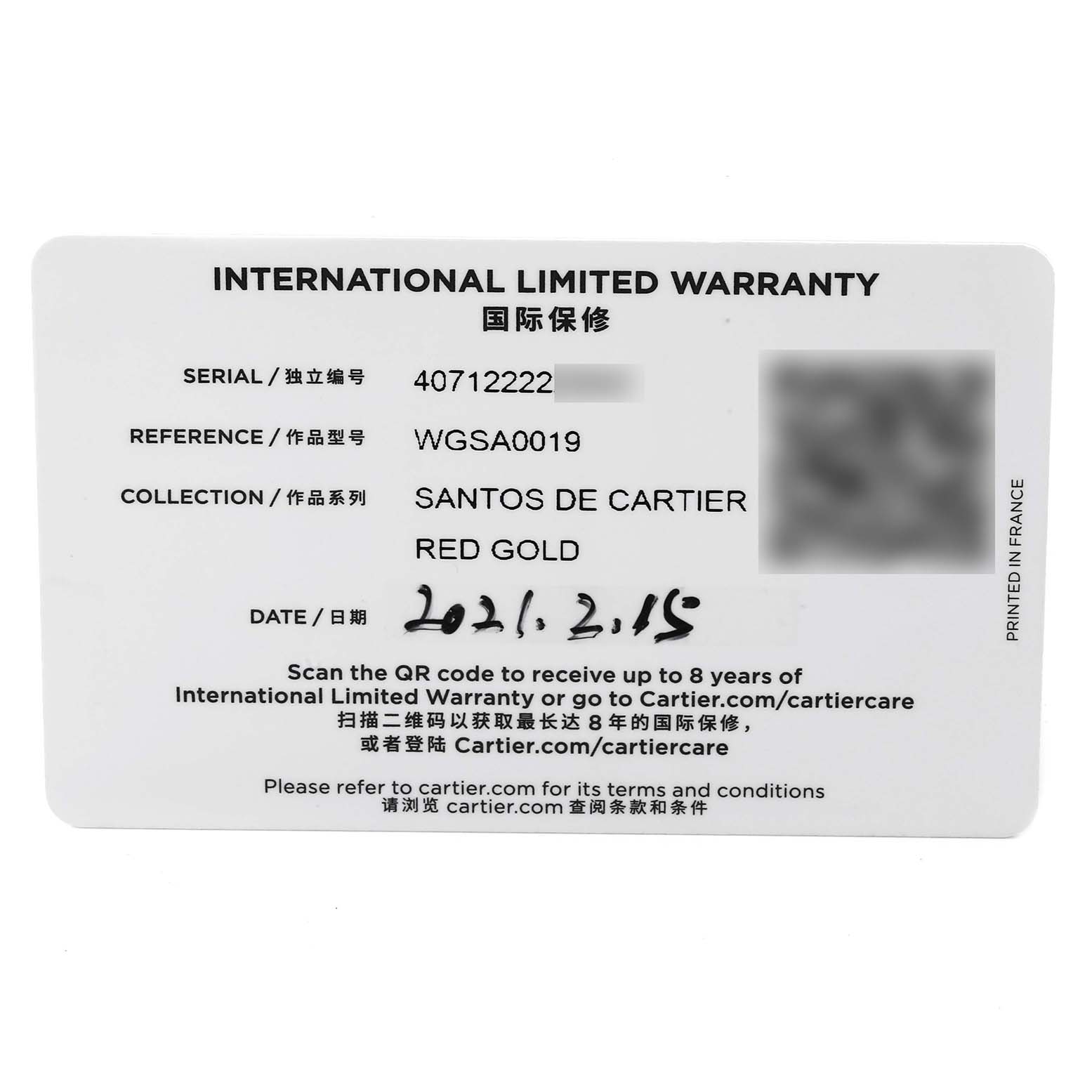 This is an International Limited Warranty card for the Santos de Cartier watch model, showcasing serial and reference numbers.