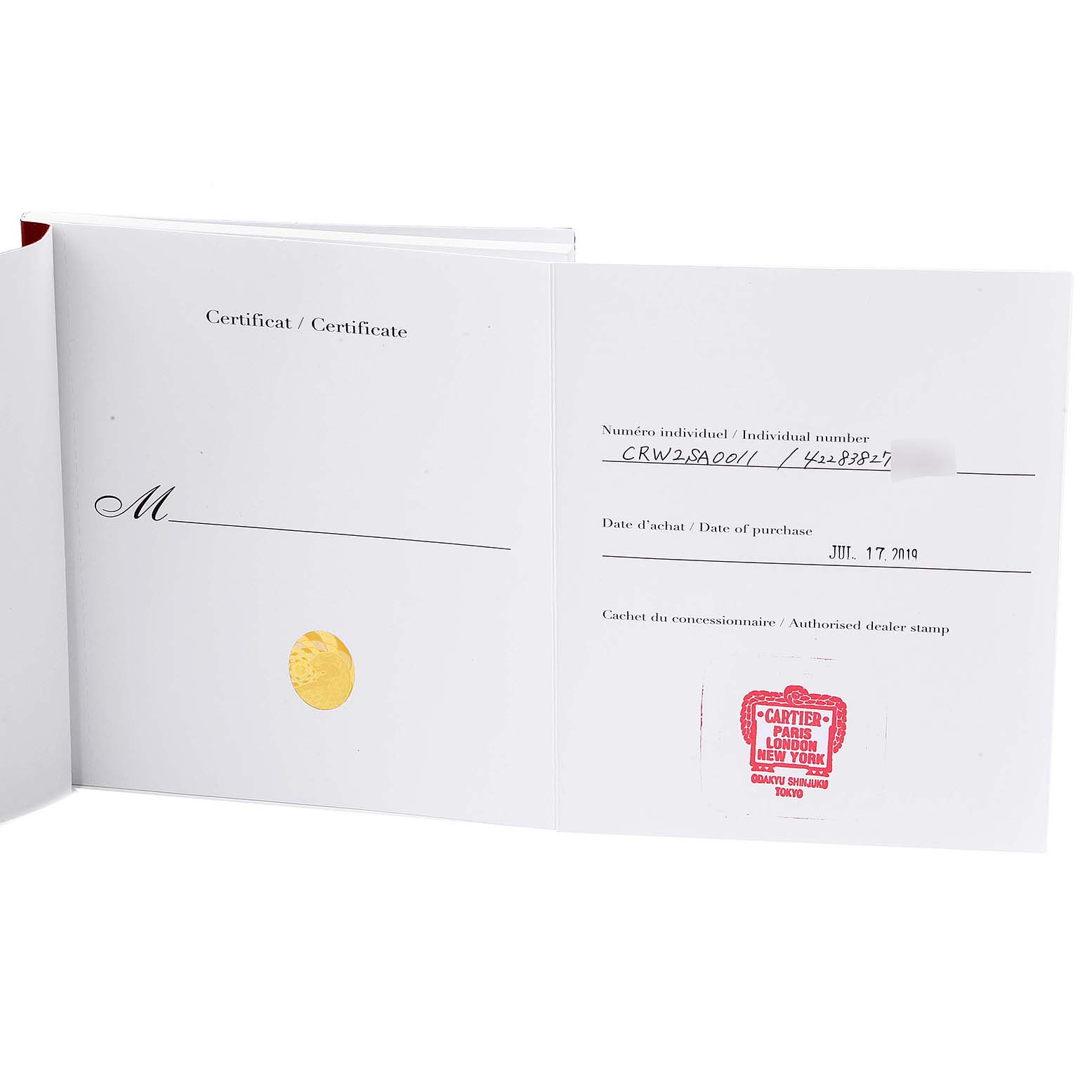 This image shows an opened authenticity certificate for a Santos Dumont model by Cartier.