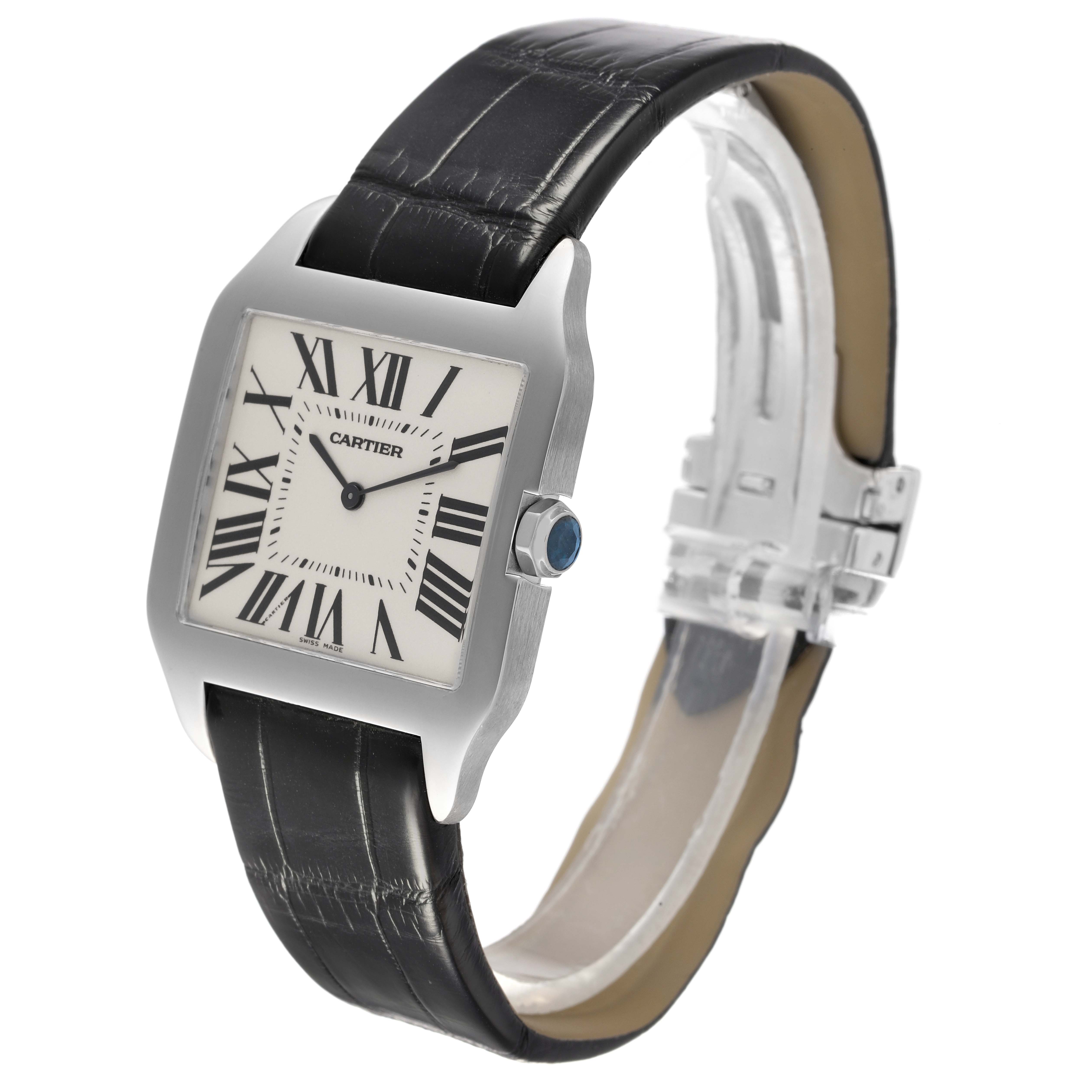 The Cartier Santos Dumont W2007051 Men's White Gold Silver Dial W2007051 Men's White Gold Silver Dial watch is shown from a front-side angle highlighting the dial, case, strap, and crown.