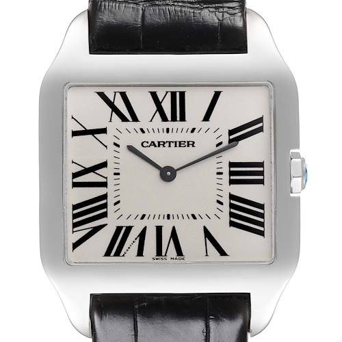 The Cartier Santos Dumont watch is shown from the front, highlighting the square face, Roman numerals, and dark strap.