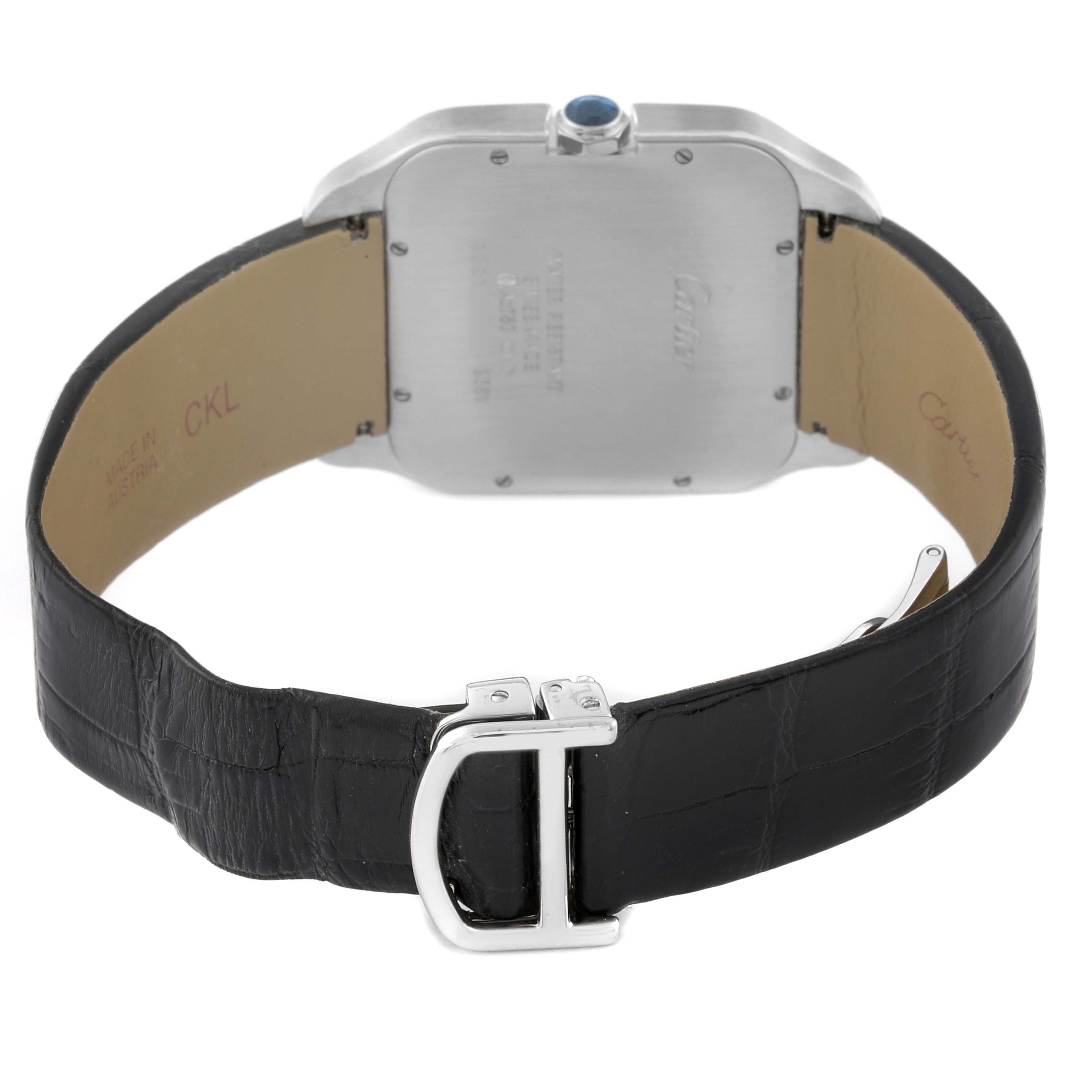 The Cartier Santos Dumont W2007051 Men's White Gold Silver Dial W2007051 Men's White Gold Silver Dial watch is shown from the back, highlighting the case back, strap, and buckle.